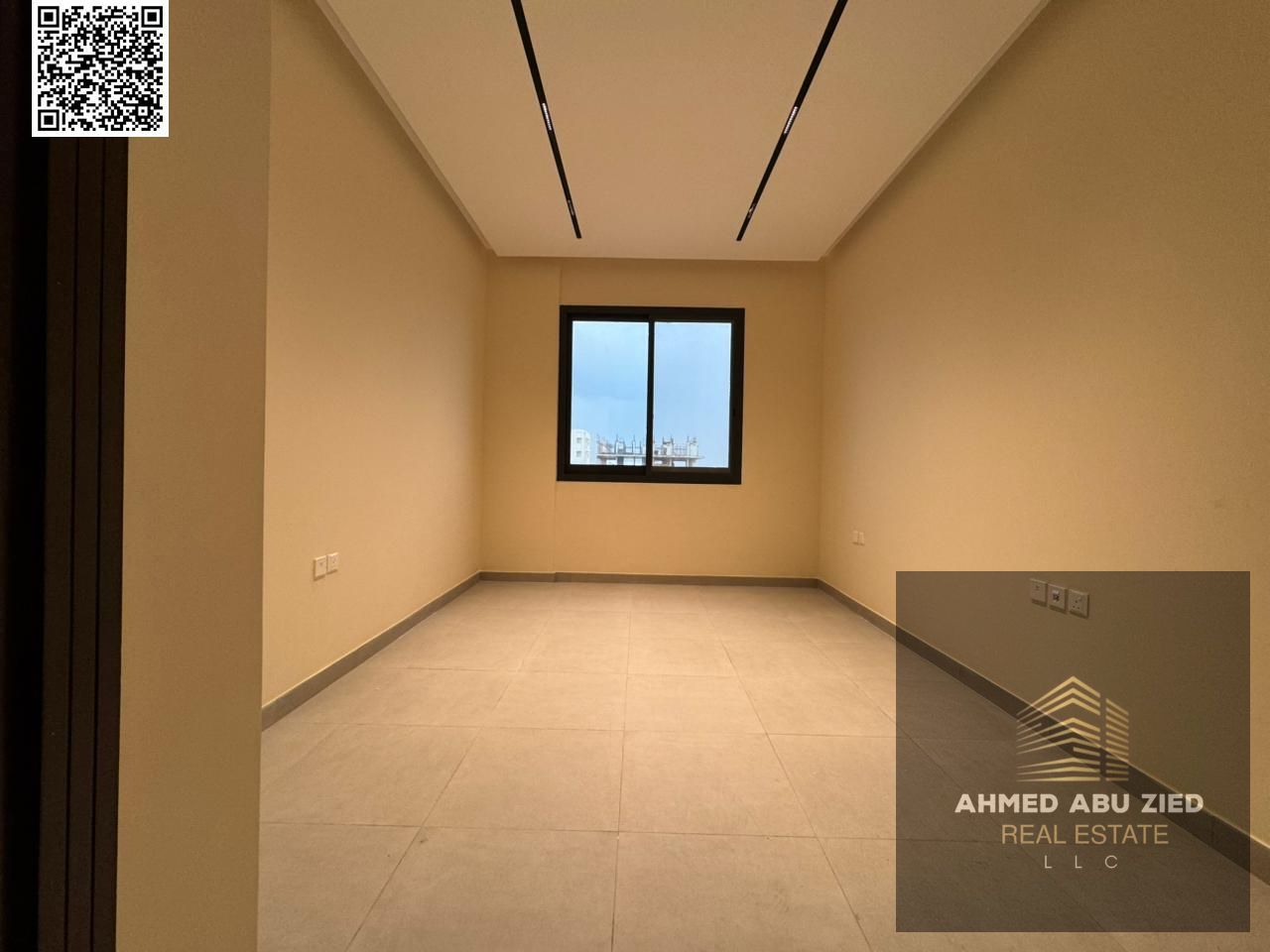 The most luxurious, affordable, and elegant apartment for annual rent in Al Jurf 3, Ajman. It features a master bedroom, a spacious living room, and t