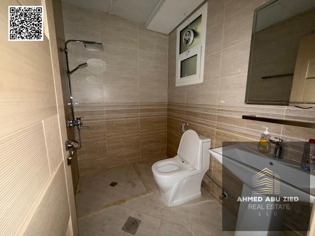 Two-bedroom apartment with a living room for annual rent in Al Muwaihat 3 – Balcony, central air conditioning, and built-in wardrobes | One month free