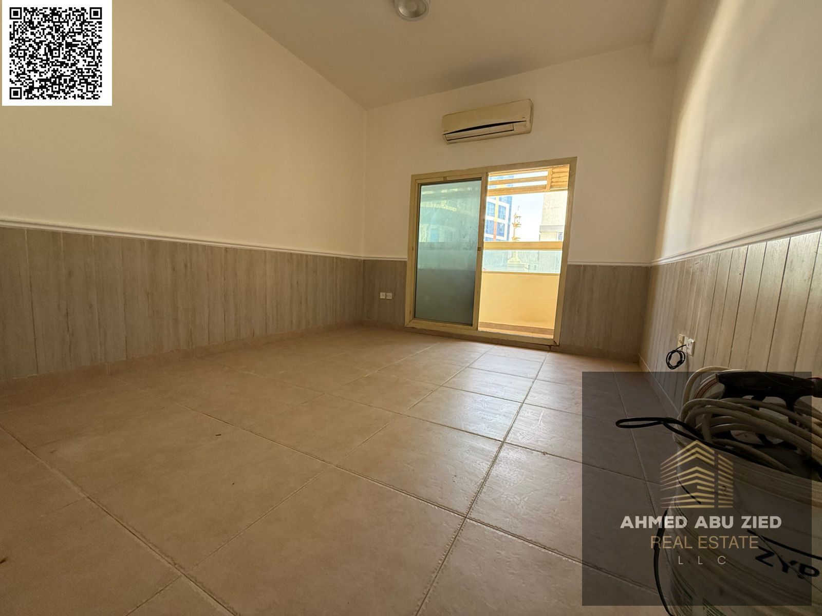 Spacious 1BHK for annual rent in Al Rawda 2 – master bedroom, balcony, split AC, built-in wardrobes