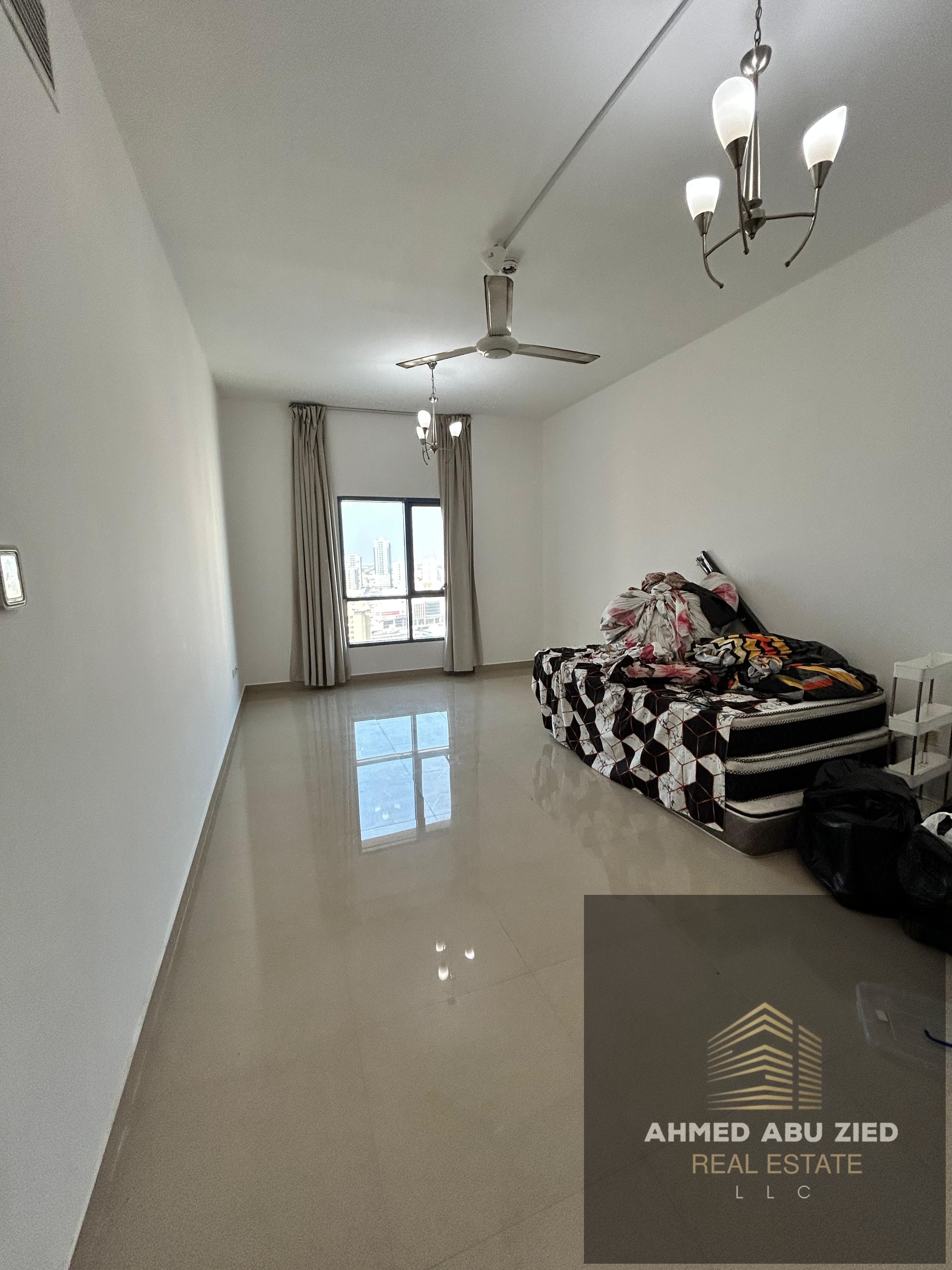 2BHK for sale in Al Nuaimiya Tower C, Ajman – open view of Al Hikma School and Black Ramada, 1482 sq. ft, flexible payment plan