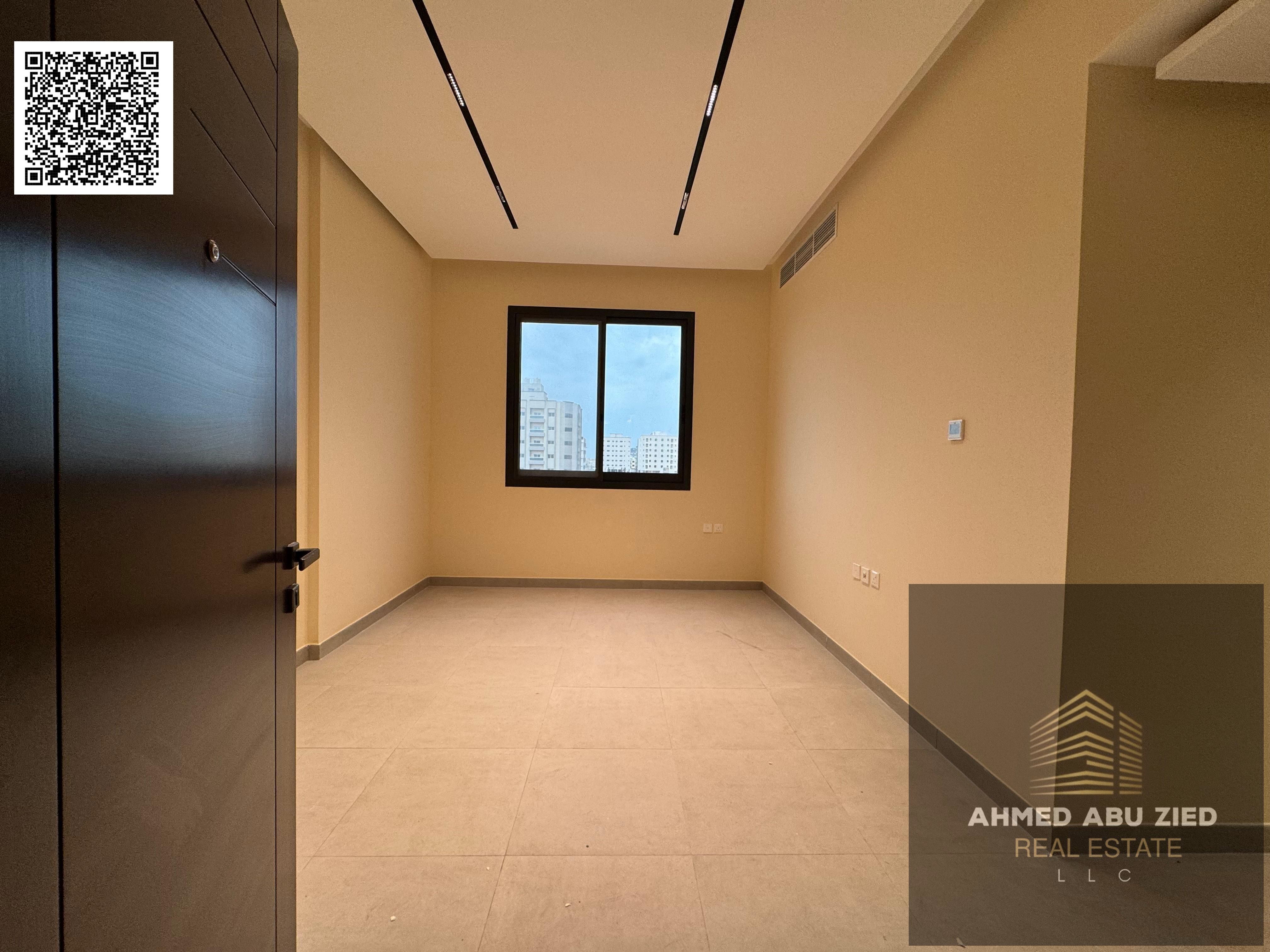 Luxurious two-bedroom apartment with a living room, brand new in Al Jurf 3 | Central air conditioning | Balcony | Super deluxe | One month free | 43,0