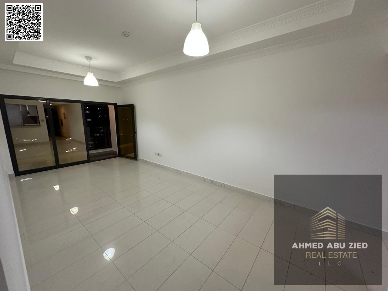 One bedroom and living room apartment for annual rent in Ajman, Al Rashidiya 1, with gym, swimming pool, aqua park, and parking. It includes two bathr