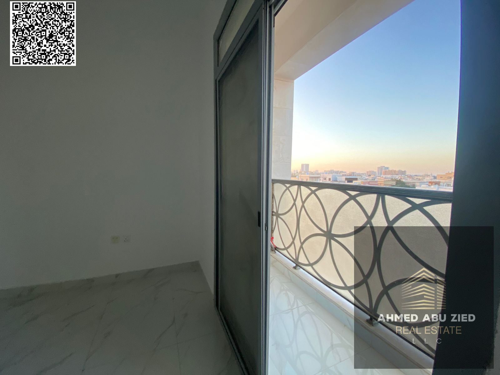 Two-bedroom apartment with living room, second occupant, spacious layout, balcony with open view, directly on Sheikh Ammar St, luxury modern finishes,