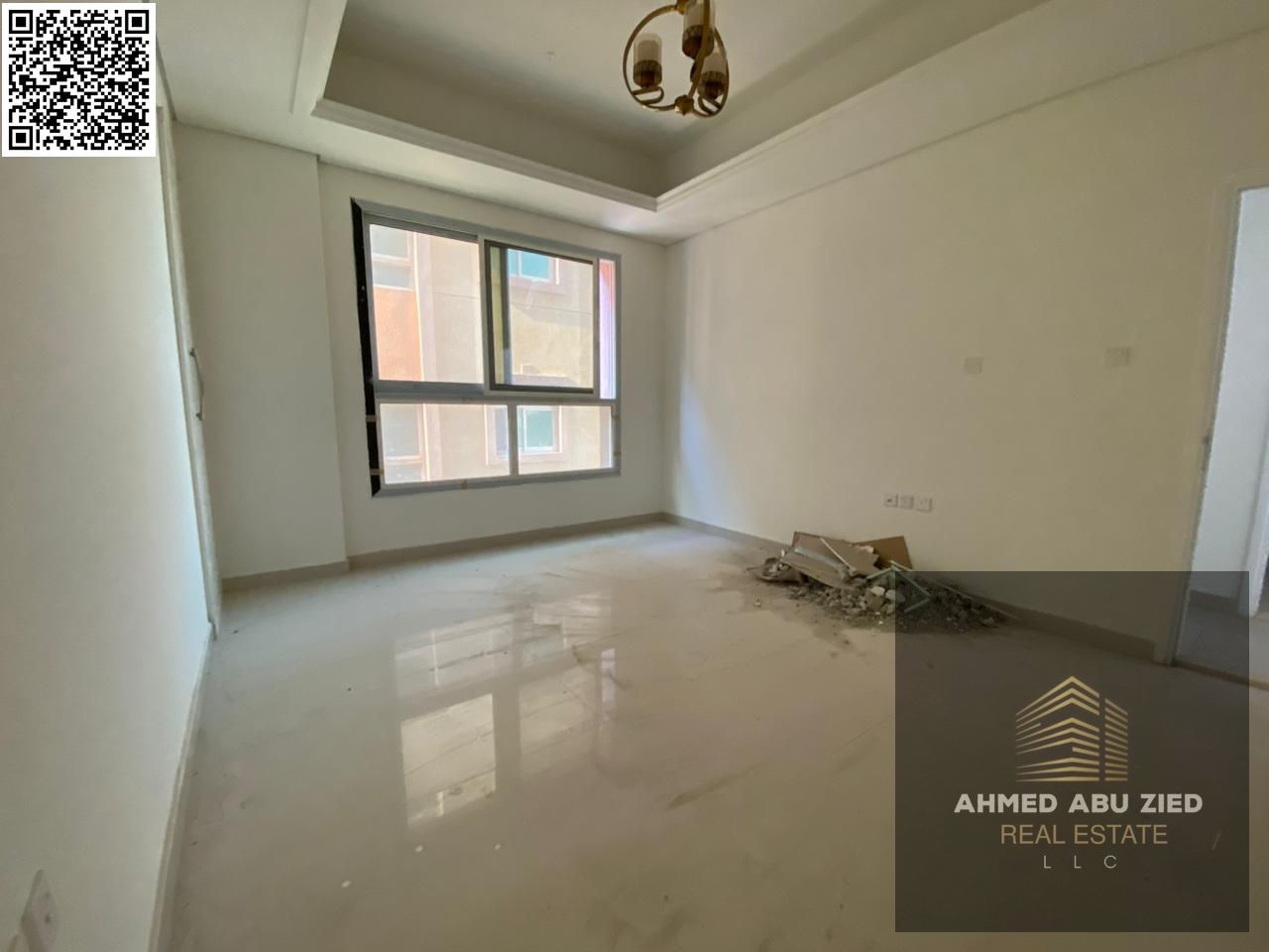 Luxurious and elegant two-bedroom apartment with a spacious kitchen, central air conditioning, second occupant, Al Muwaihat 3, near the schools street