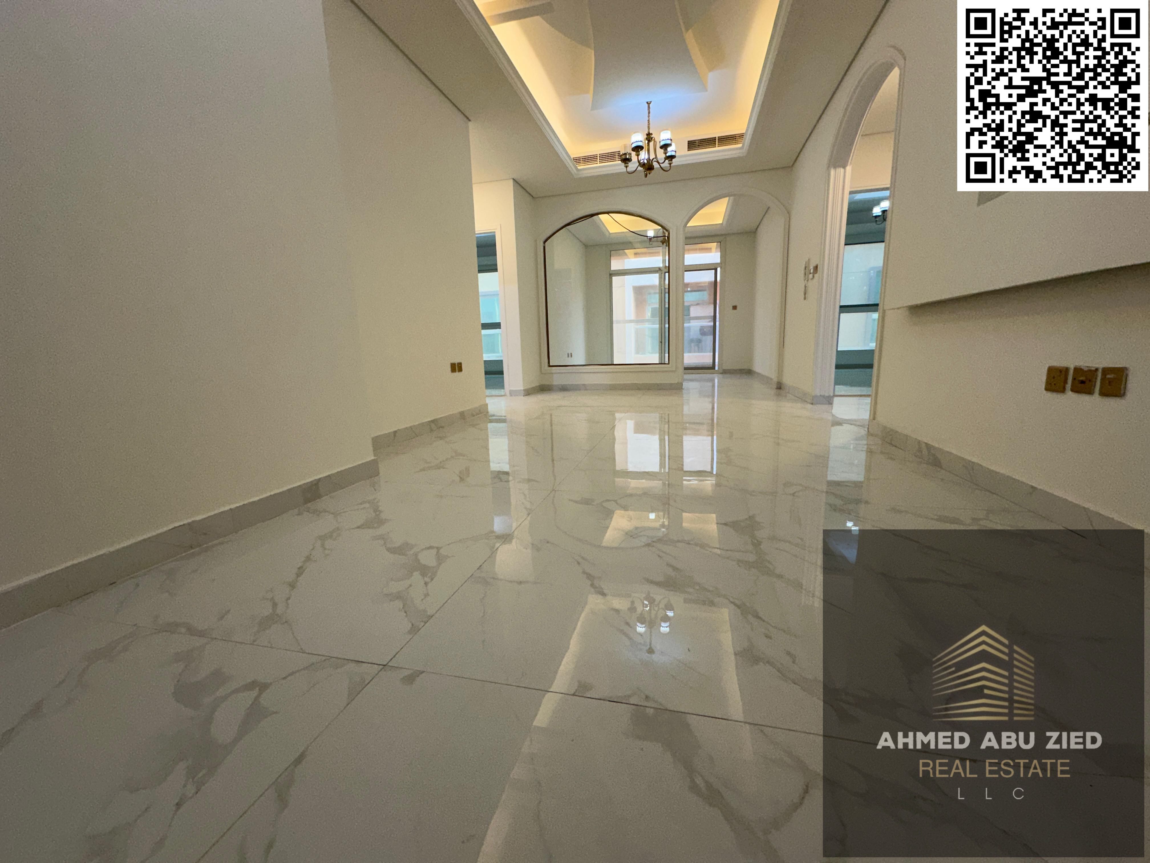 Luxurious and elegant 2-bedroom apartment with a living room, majlis (formal sitting room), and very spacious kitchen. Features include a distinctive
