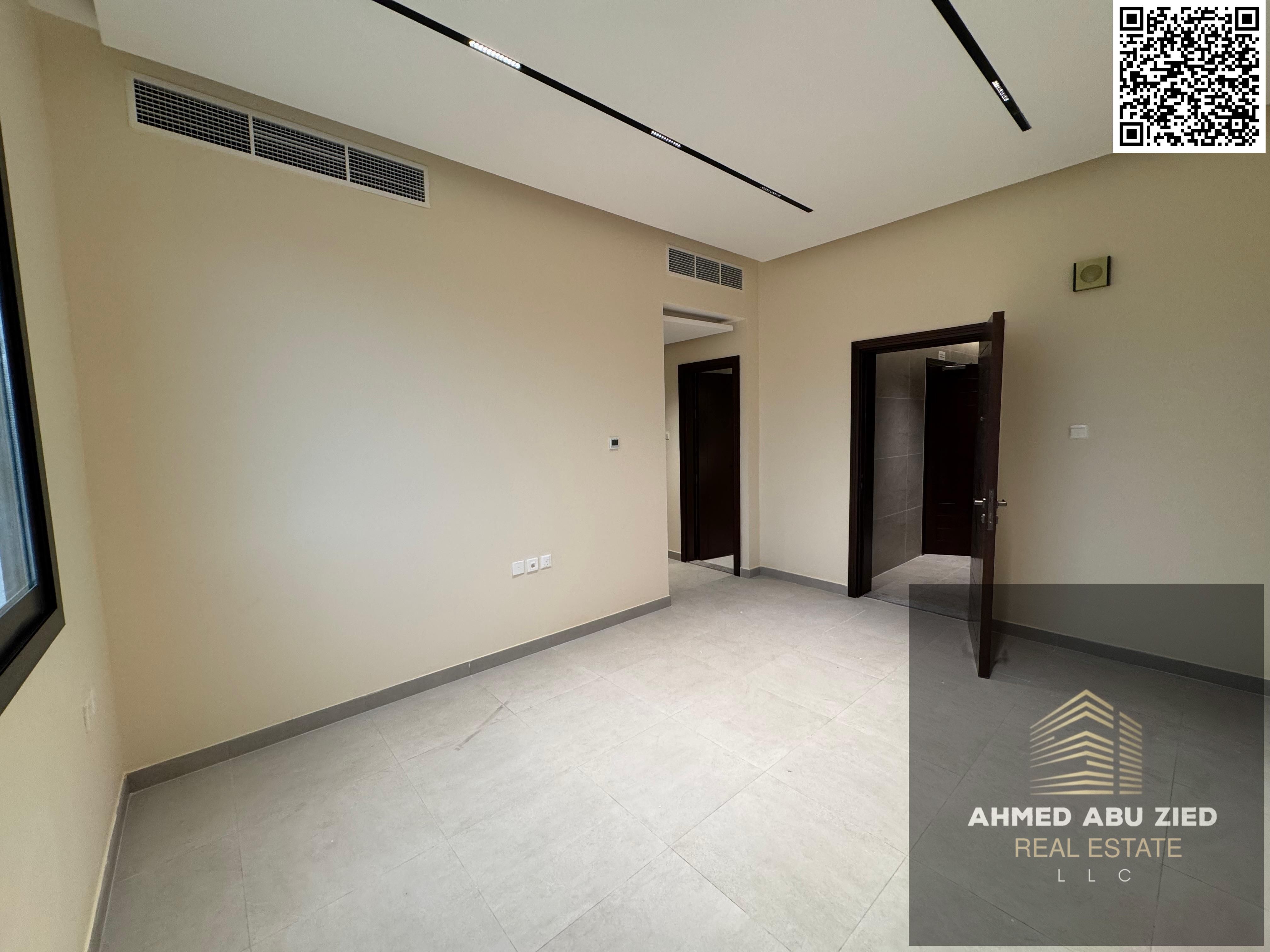 Upscale and luxurious two-bedroom apartment with a large living room, spacious kitchen, balcony, two open bathrooms, central air conditioning, built-i