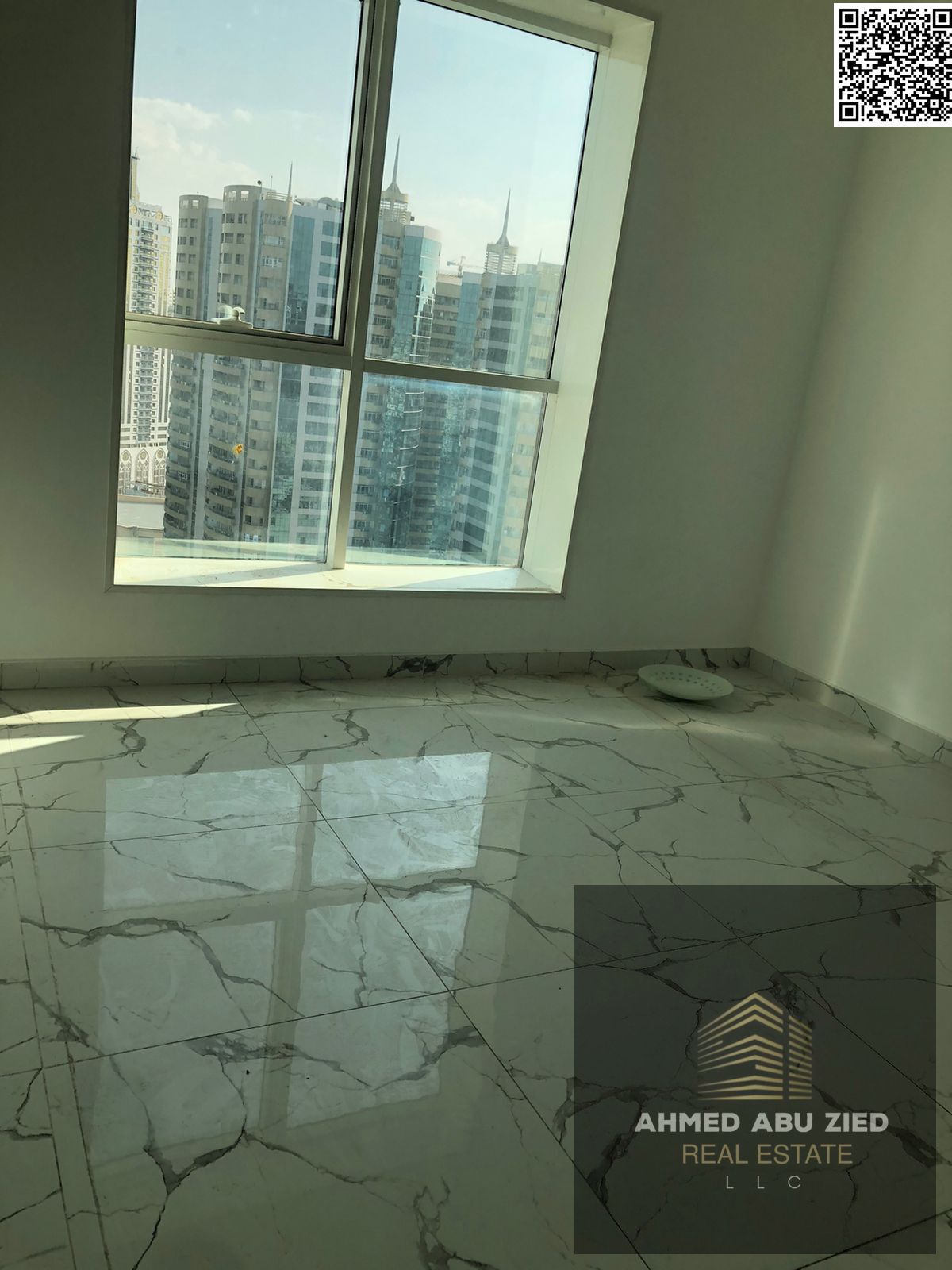 Luxurious and elegant 3-bedroom apartment with a large living room, spacious kitchen, 2 balconies, 3 bathrooms, central air conditioning, and a laundr