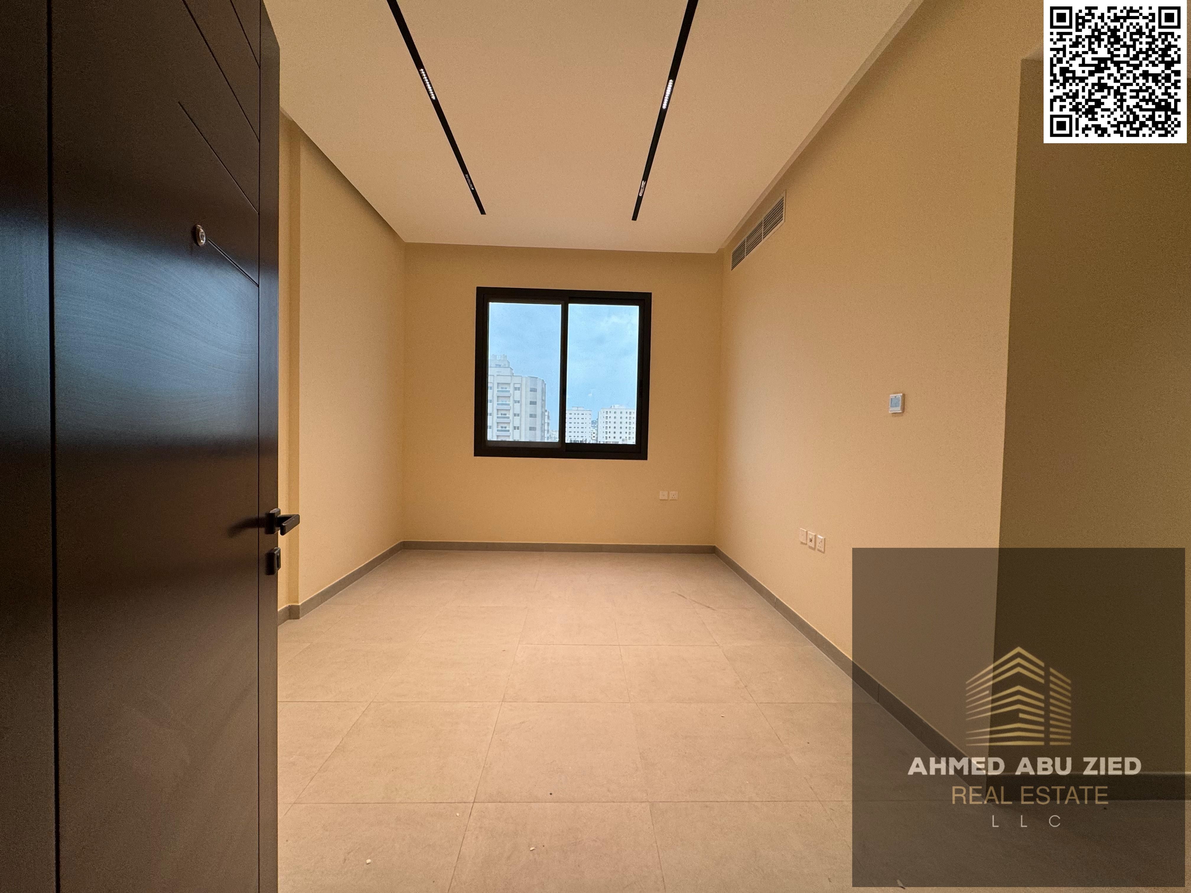 Luxurious and elegant two-bedroom apartment with a large living room, first occupancy, modern design, two distinctive bathrooms, central air condition