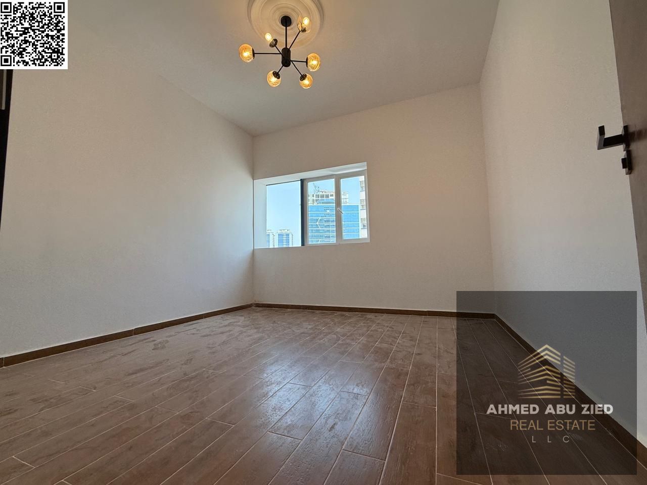 Luxurious two-bedroom apartment with a living room, featuring high-end finishes, a spacious living room, and a modern kitchen. Located in a quiet buil