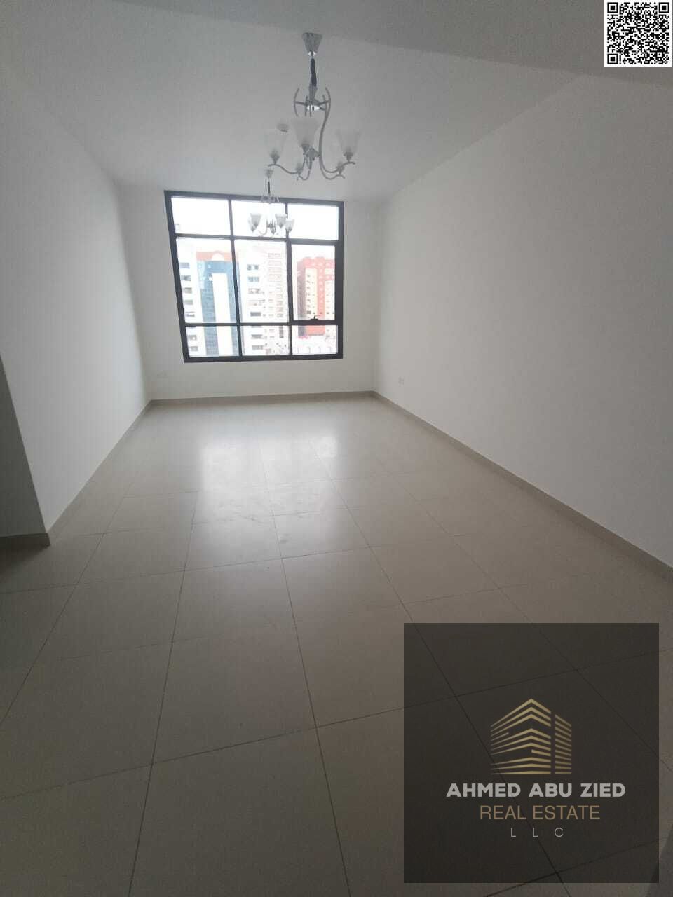 Upscale and luxurious two-bedroom apartment with a large living room, spacious kitchen, built-in wardrobes, two bathrooms, central air conditioning, a