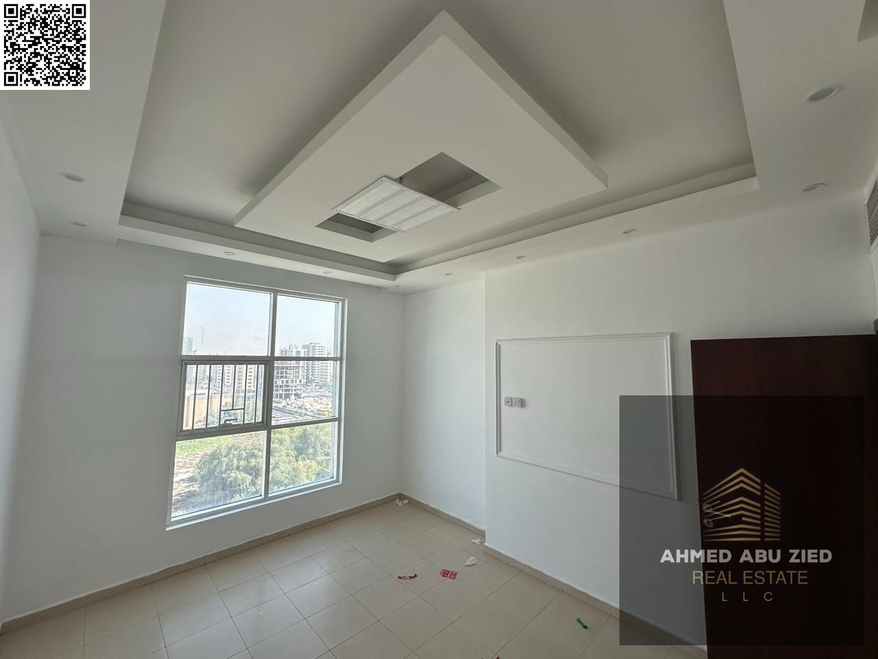 Upscale and luxurious two-bedroom apartment with a large living room, modern kitchen, balcony with open views, two bathrooms, central air conditioning