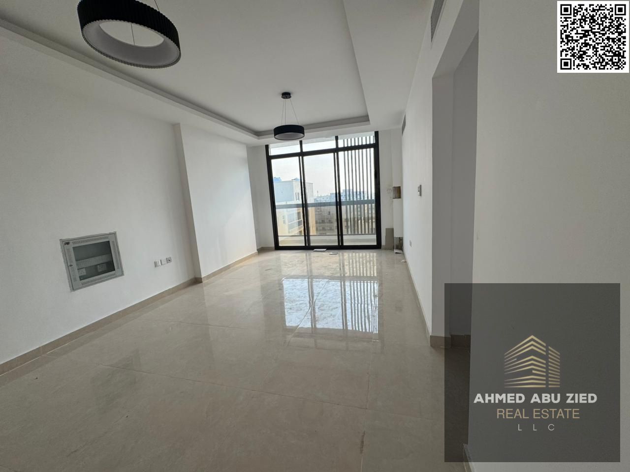 Luxurious and elegant two-bedroom apartment with a large living room, modern kitchen, three bathrooms, central air conditioning, balcony, and open vie