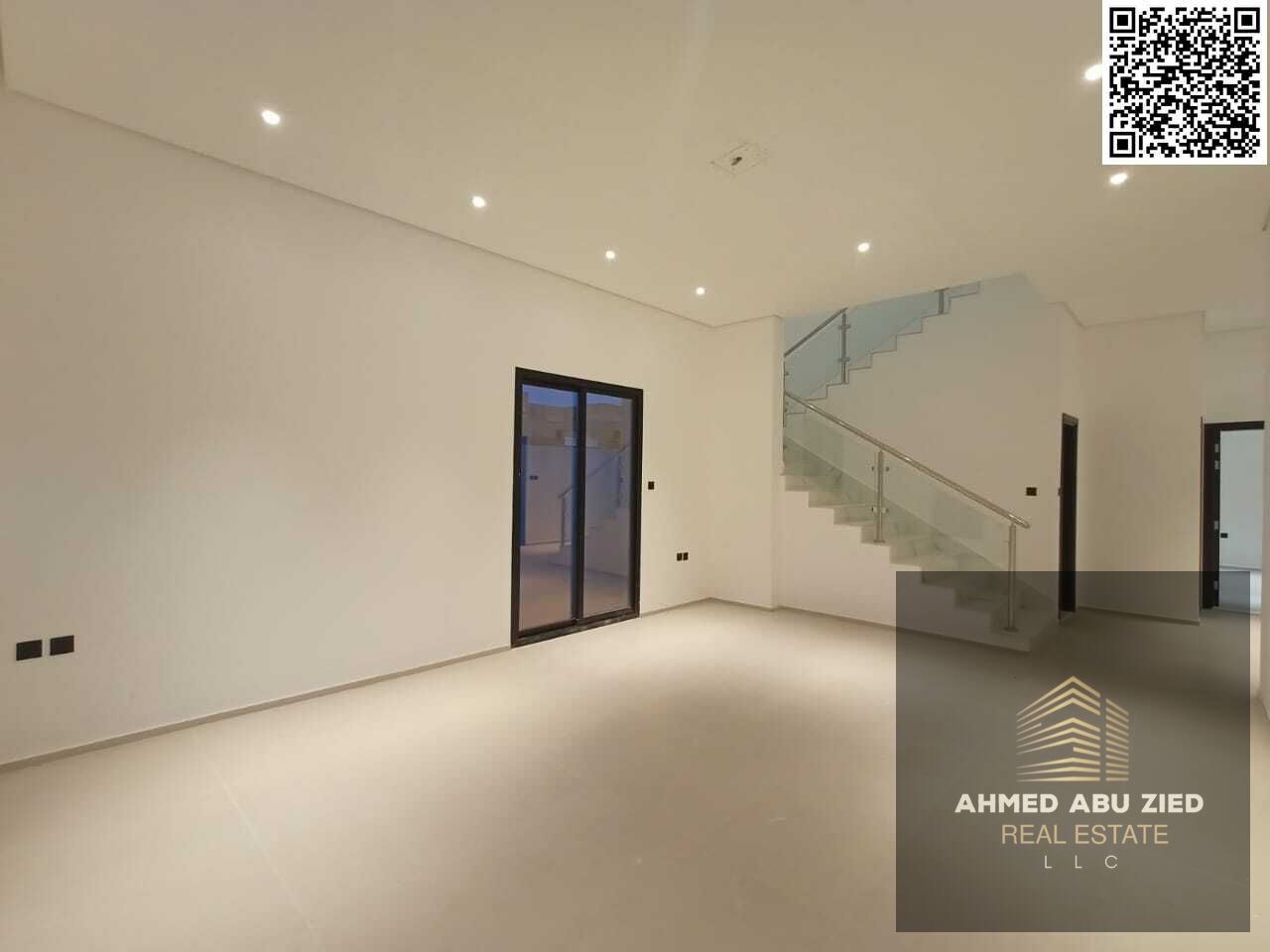Luxury villa with 4 master bedrooms, a large living room, an Arabic majlis, a modern kitchen, built-in wardrobes, 6 bathrooms, a maid's room, air cond