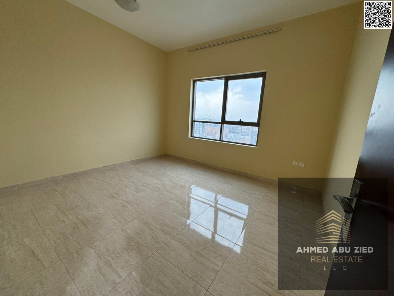 Upscale and luxurious 3-bedroom apartment with a large living room, spacious kitchen, 3 bathrooms, built-in wardrobes, central air conditioning, and a