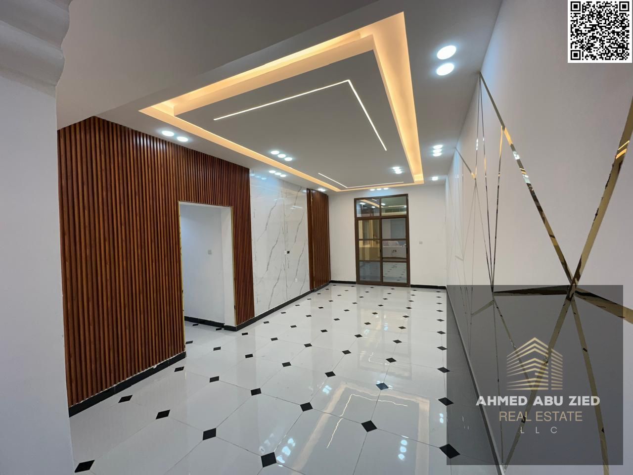 Upscale and luxurious two-bedroom apartment with a large living room, spacious kitchen, two bathrooms, central air conditioning, and high-end hotel-st
