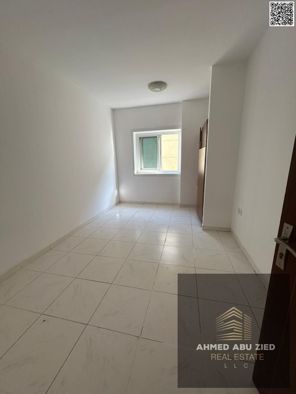 Upscale and luxurious two-bedroom apartment with a large living room, spacious kitchen, two bathrooms, balcony, open view, central air conditioning, f