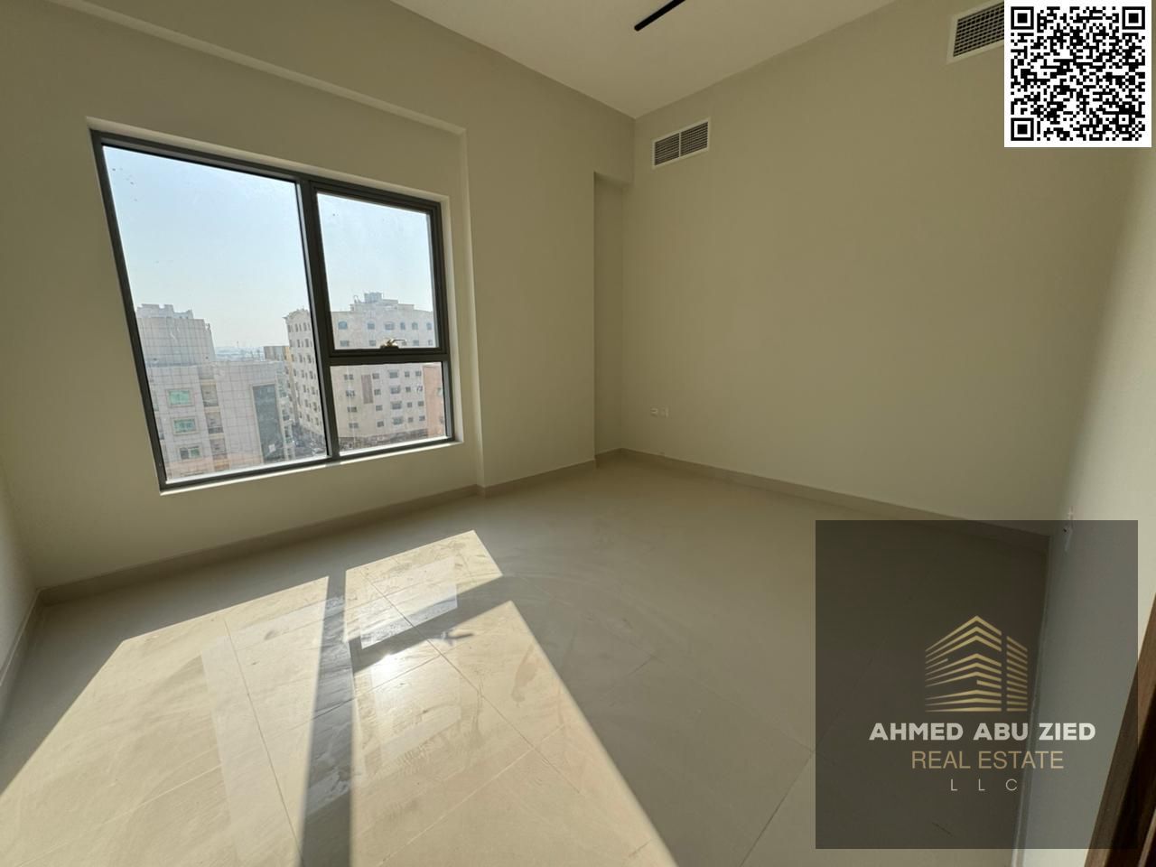 Upscale and luxurious two-bedroom apartment with a large living room, spacious kitchen, two bathrooms, built-in wardrobes, balcony with open views, ce