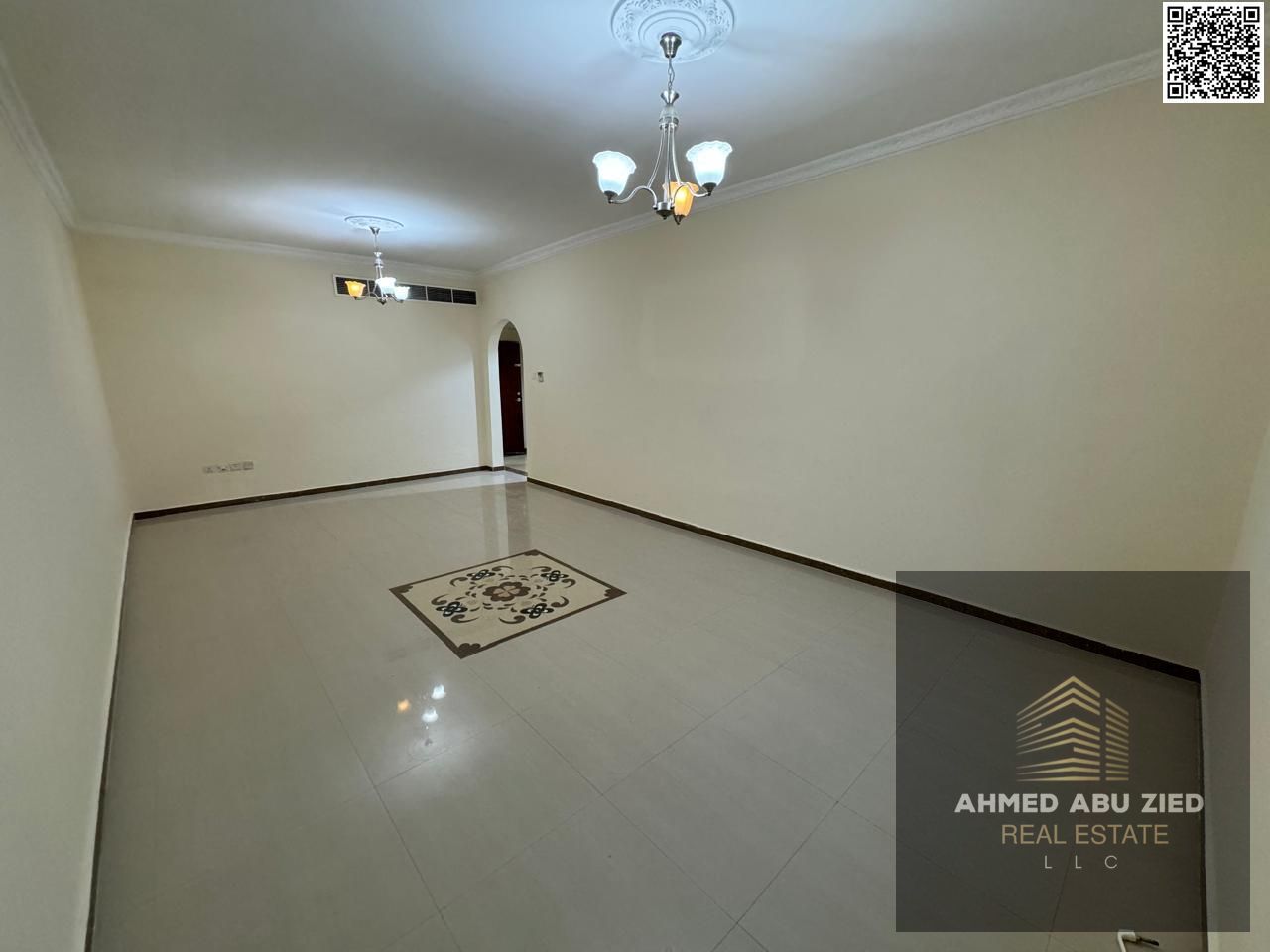 Two luxurious bedrooms, including a master bedroom, a large living room, a modern kitchen, a balcony with an open view, two bathrooms, central air con
