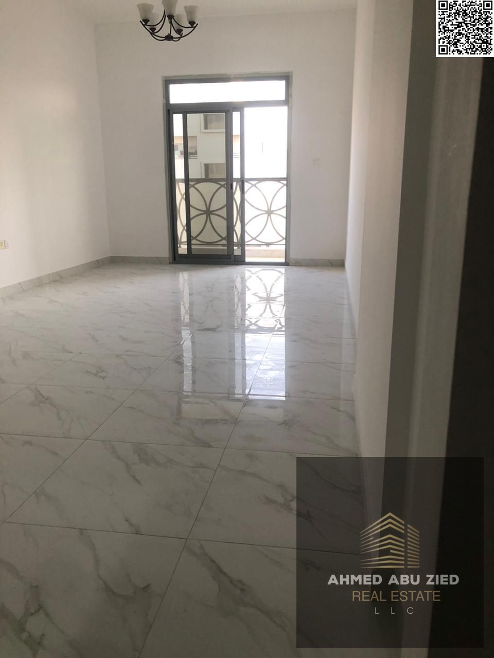 Luxurious and elegant two-bedroom apartment with a large living room, spacious kitchen, three bathrooms, balcony, open view, central air conditioning,
