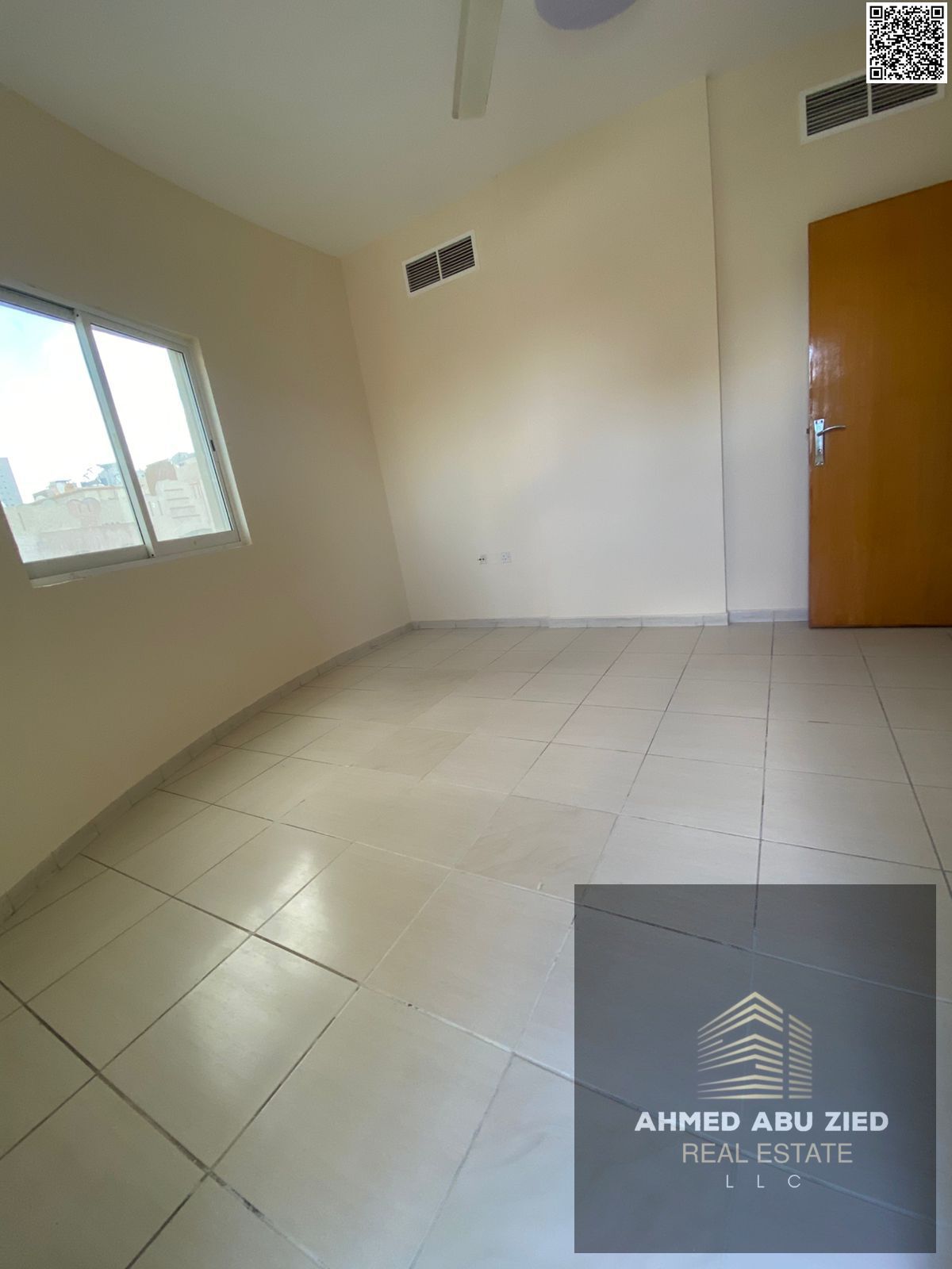 The best, most elegant, and luxurious two-bedroom apartment with a large living room, spacious kitchen, balcony with an open view, two bathrooms, cent