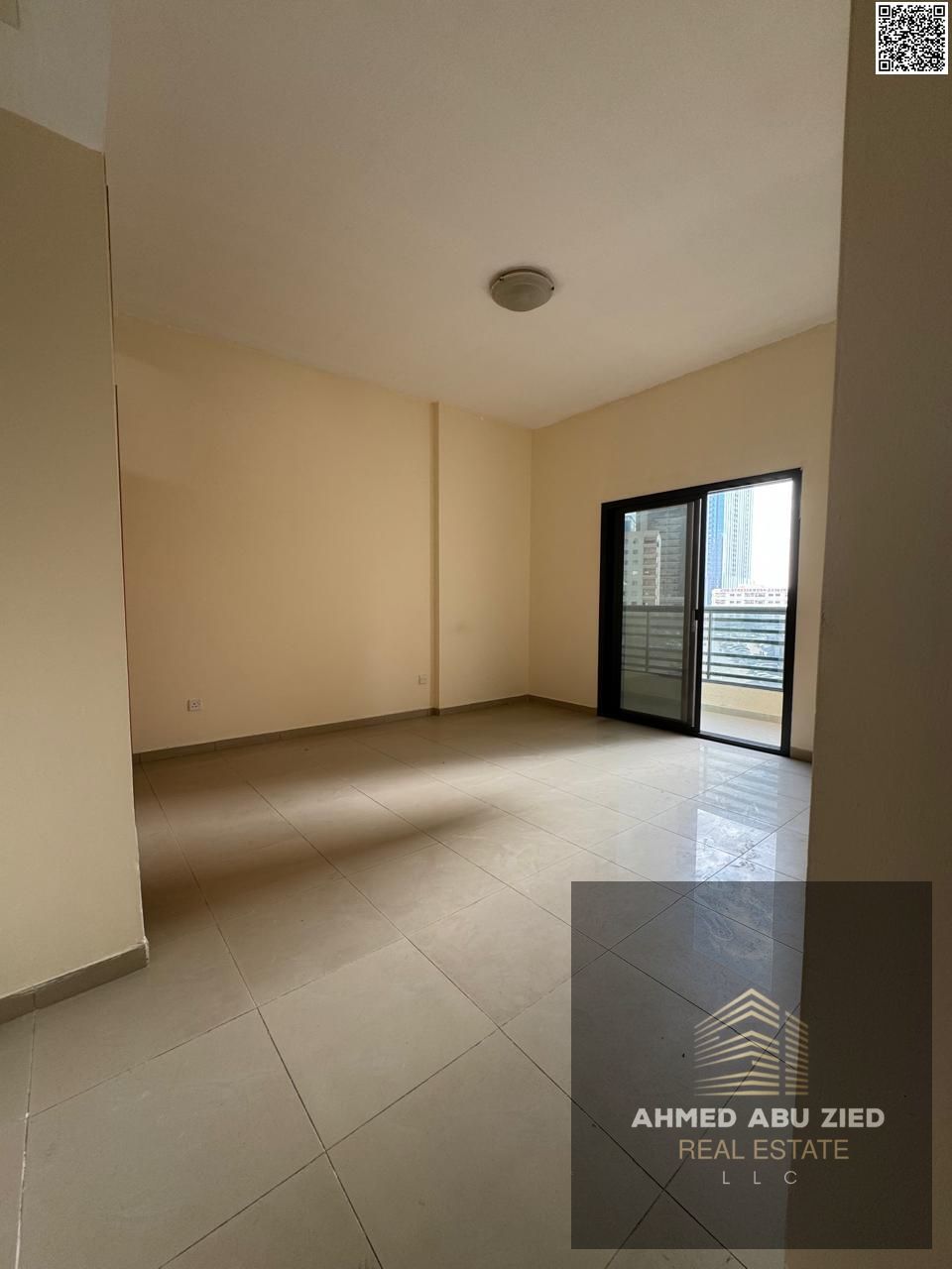 Upscale and luxurious two-bedroom apartment with a large living room, spacious kitchen, central air conditioning, balcony with open views, two bathro