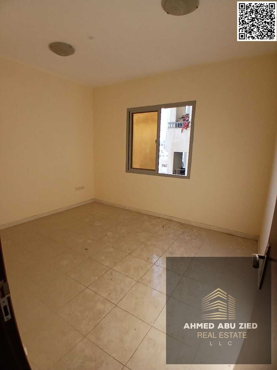 Upscale and luxurious two-bedroom apartment with a large living room, spacious kitchen, two bathrooms, central air conditioning, balcony with open vie
