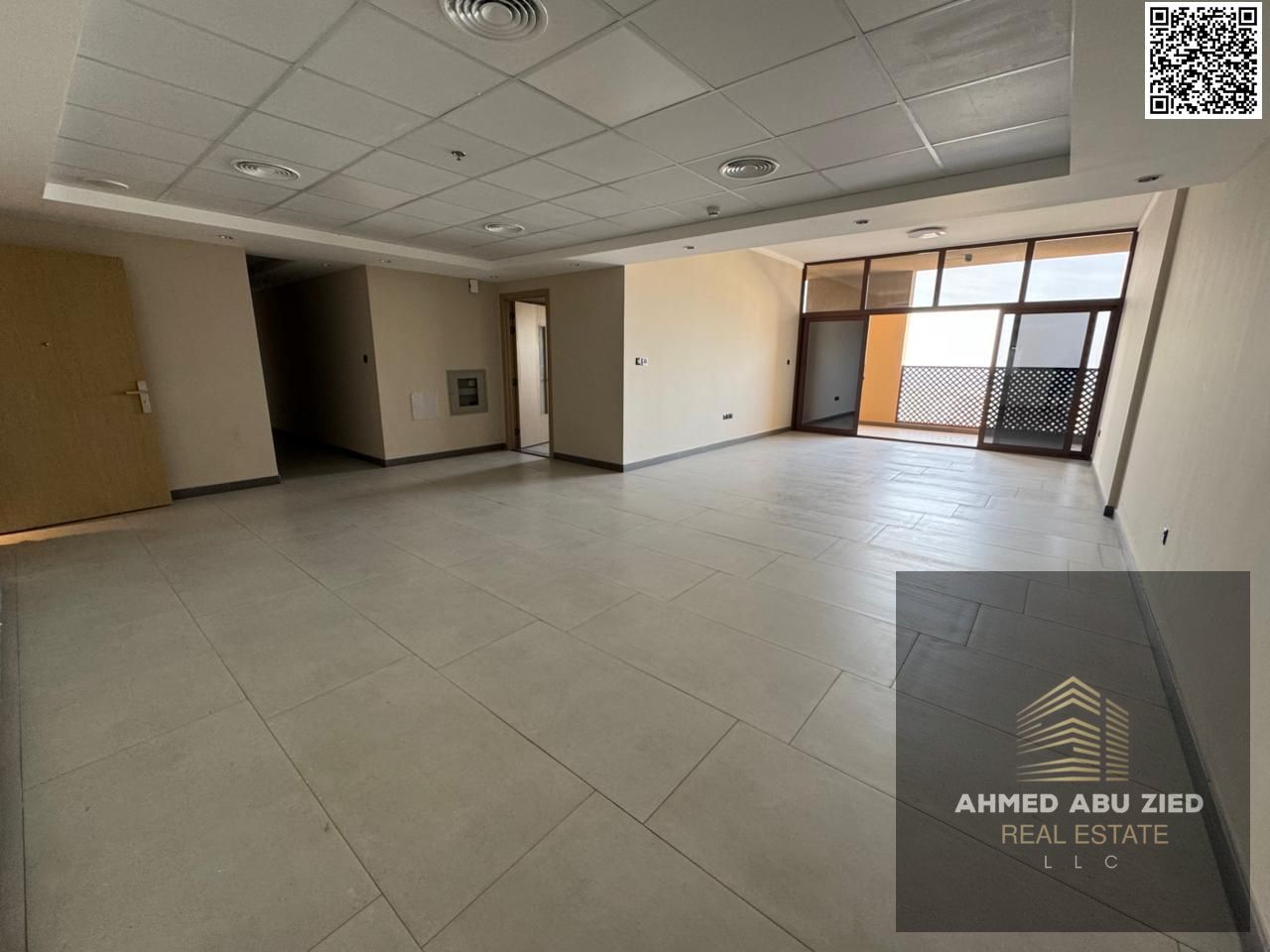 Luxurious and elegant two-bedroom apartment with a very large living room, spacious kitchen, central air conditioning, three bathrooms, maid's room an