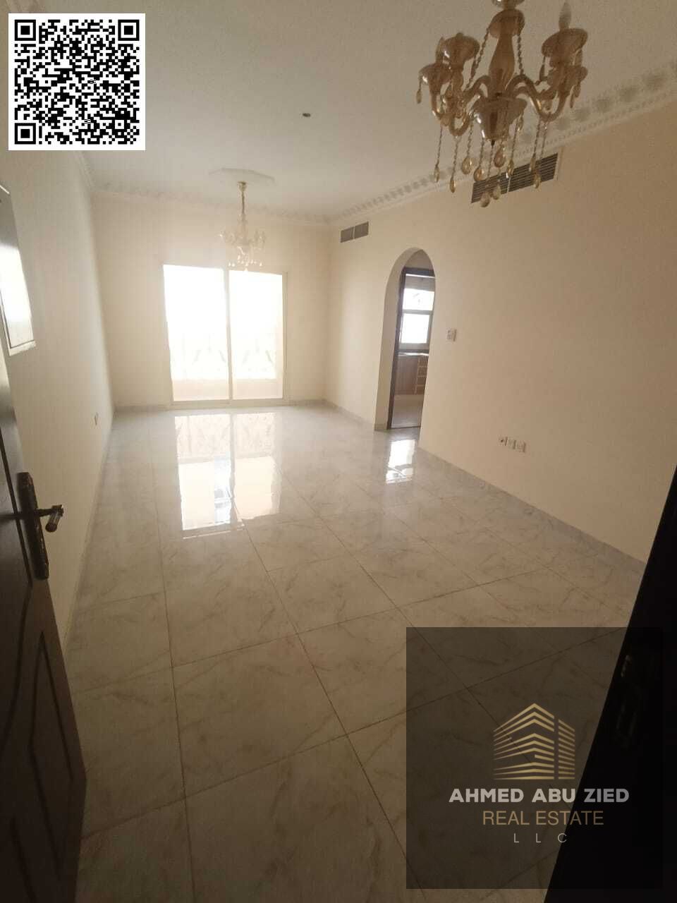 The finest and most luxurious two-bedroom apartment with a living room for annual rent in Ajman, Al Hamidiya, near Ajman Court. It features two bathro