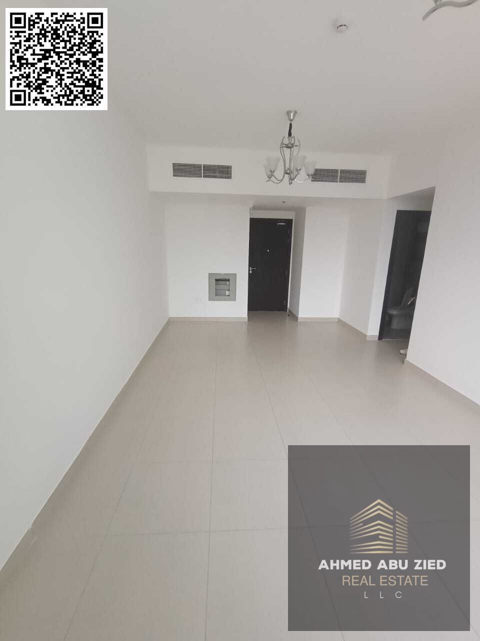Two rooms and a hall for annual rent in Ajman Al Nuaimiya 1, new tower, 2 bathrooms, built-in wardrobes, free parking, prime location near Nesto and D