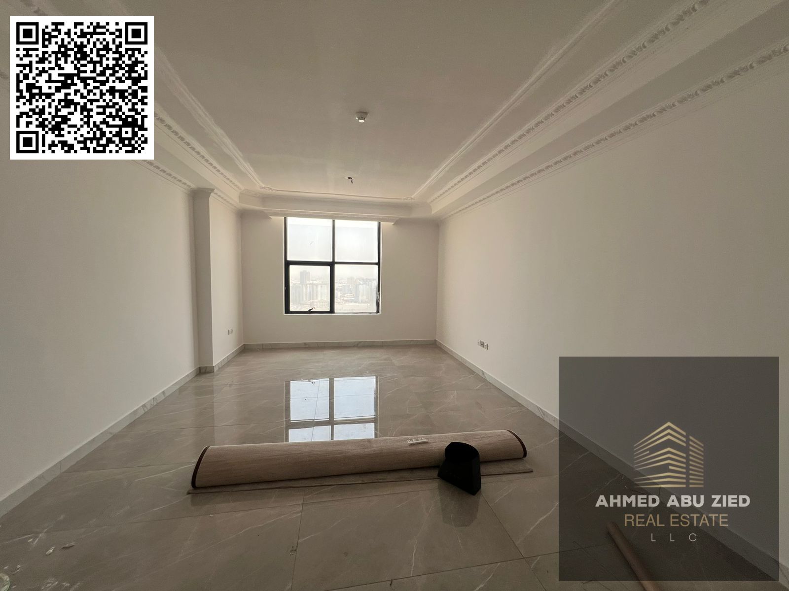 Luxury one-bedroom apartment for annual rent in Al Rashidiya 1. Features include gym, swimming pool, water park, parking, two bathrooms, balcony, and