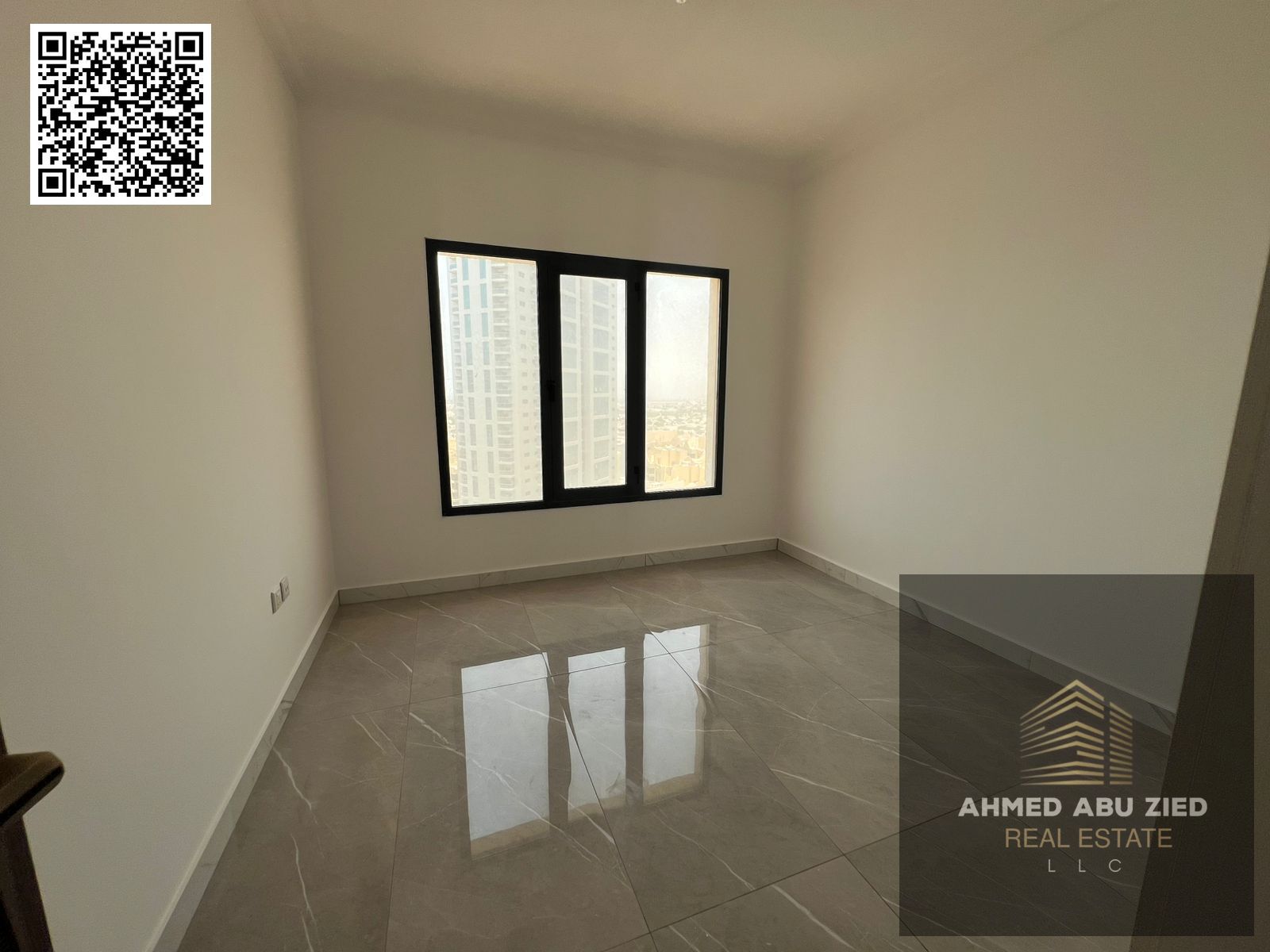 The finest and most luxurious two-bedroom apartment with a living room for annual rent in Ajman Al Rashidiya, high-end finishing, central air conditio