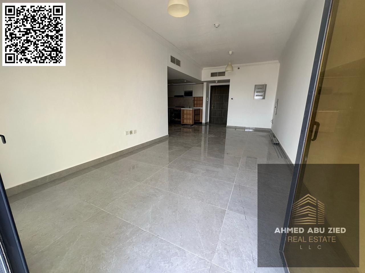 Luxury one-bedroom apartment for annual rent in Ajman, Al Rashidiya 1. Features include a gym, swimming pool, aqua park, balcony, bathroom, and applia