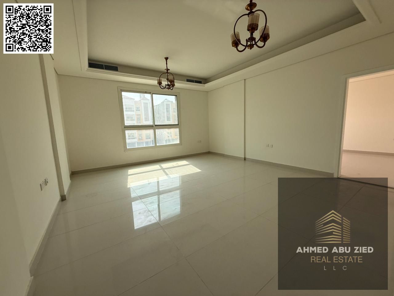 A brand new, three-bedroom apartment in Al Muwaihat 3, next to Al Shuwaifat School. It features two master bedrooms, three bathrooms, a living room, a