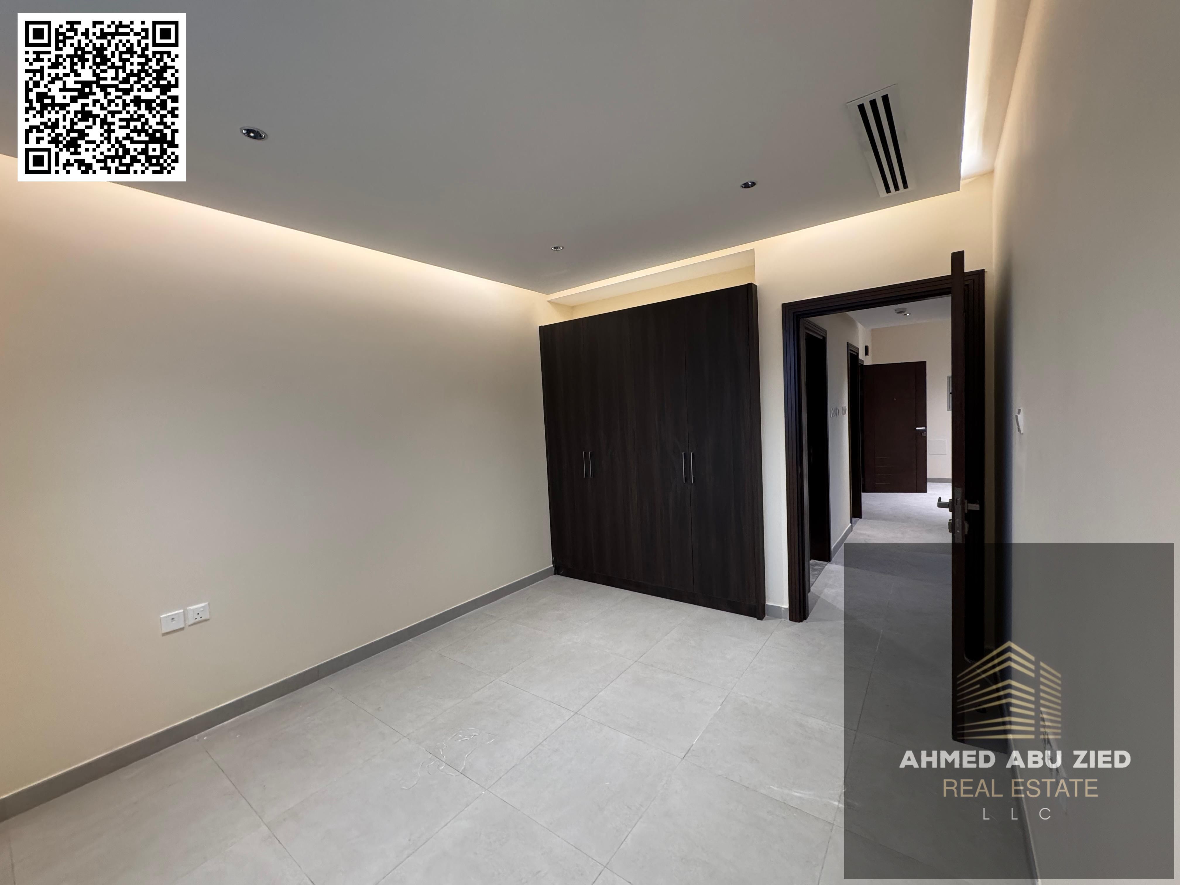 For annual rent in Ajman Al Jurf 3, first occupant, two-bedroom apartment with a living room, two bathrooms, balcony, central air conditioning, super