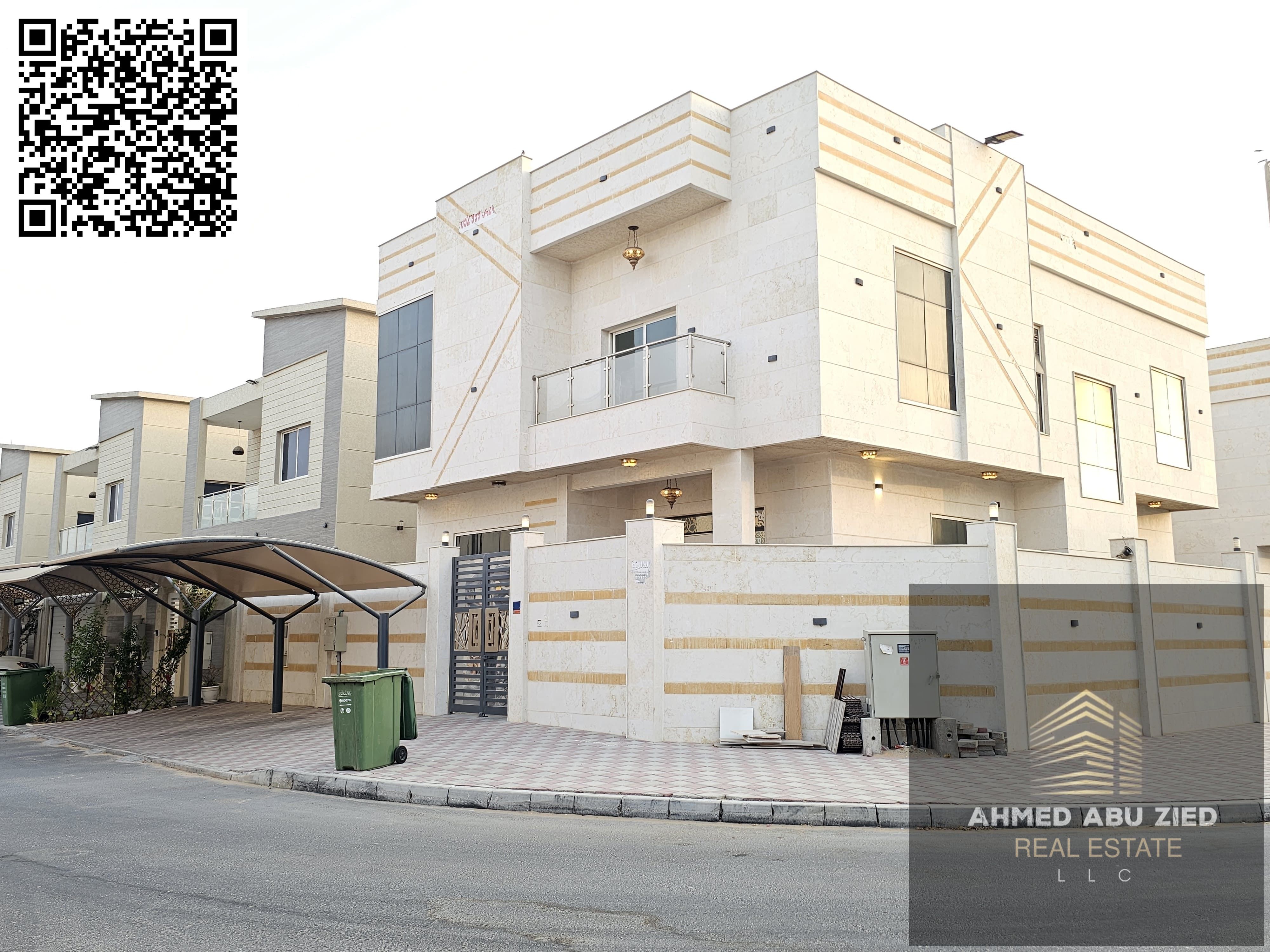A corner villa on two streets in Al Yasmin area is available for annual rent. It features 5 master bedrooms, a majlis (formal sitting room), 2 living