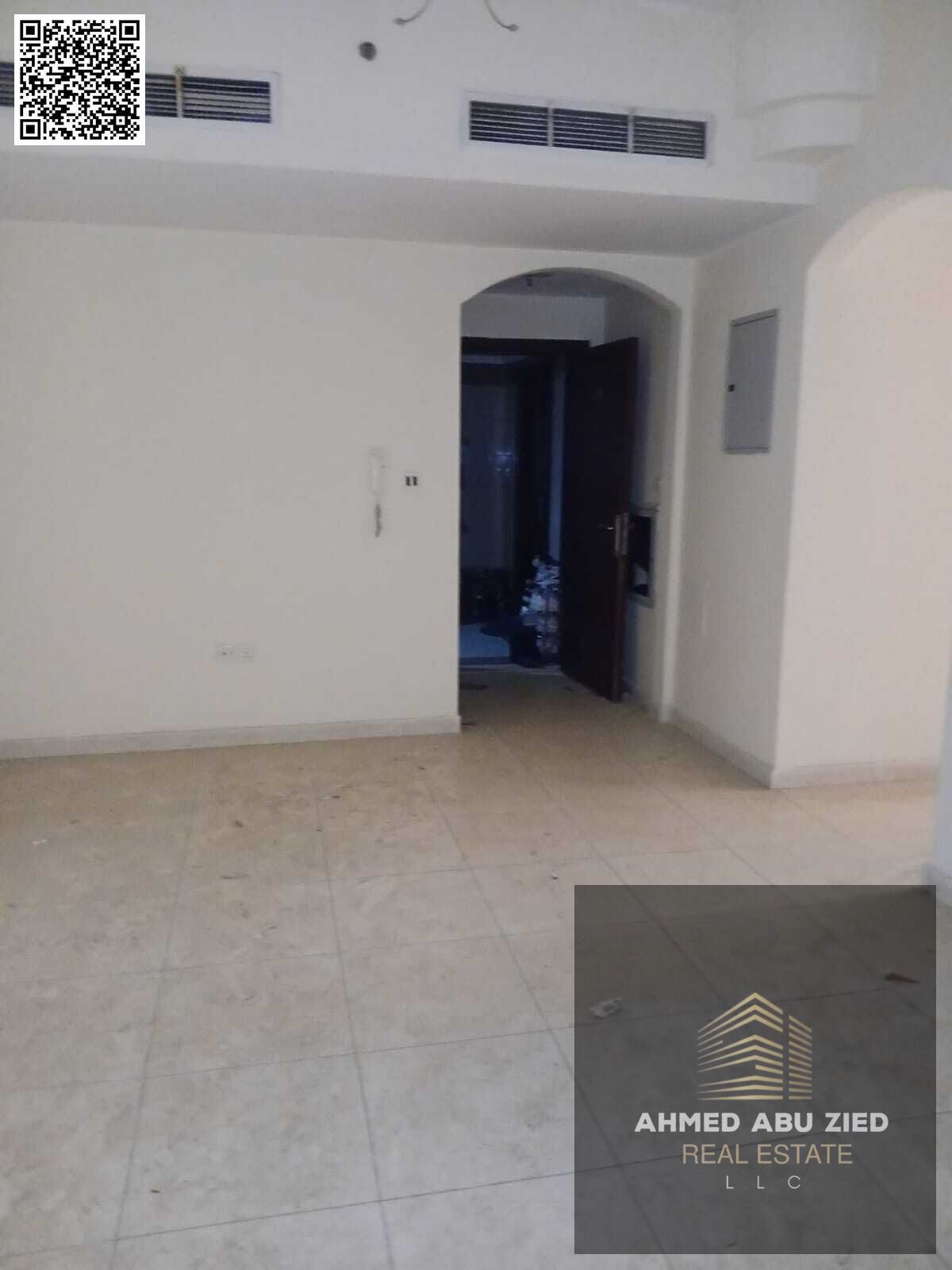 Two-bedroom apartment with a living room in Al Nuaimiya 1, Ajman. Features include two bathrooms, a large kitchen, a balcony, and a prime location. Re
