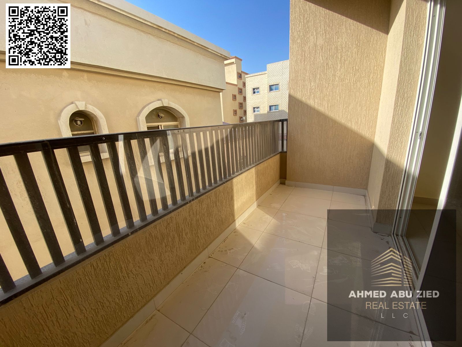 Two-bedroom apartment with a living room, master suite, first occupancy in Al Rawda 1, Ajman. Features include 3 bathrooms, a balcony, central air con
