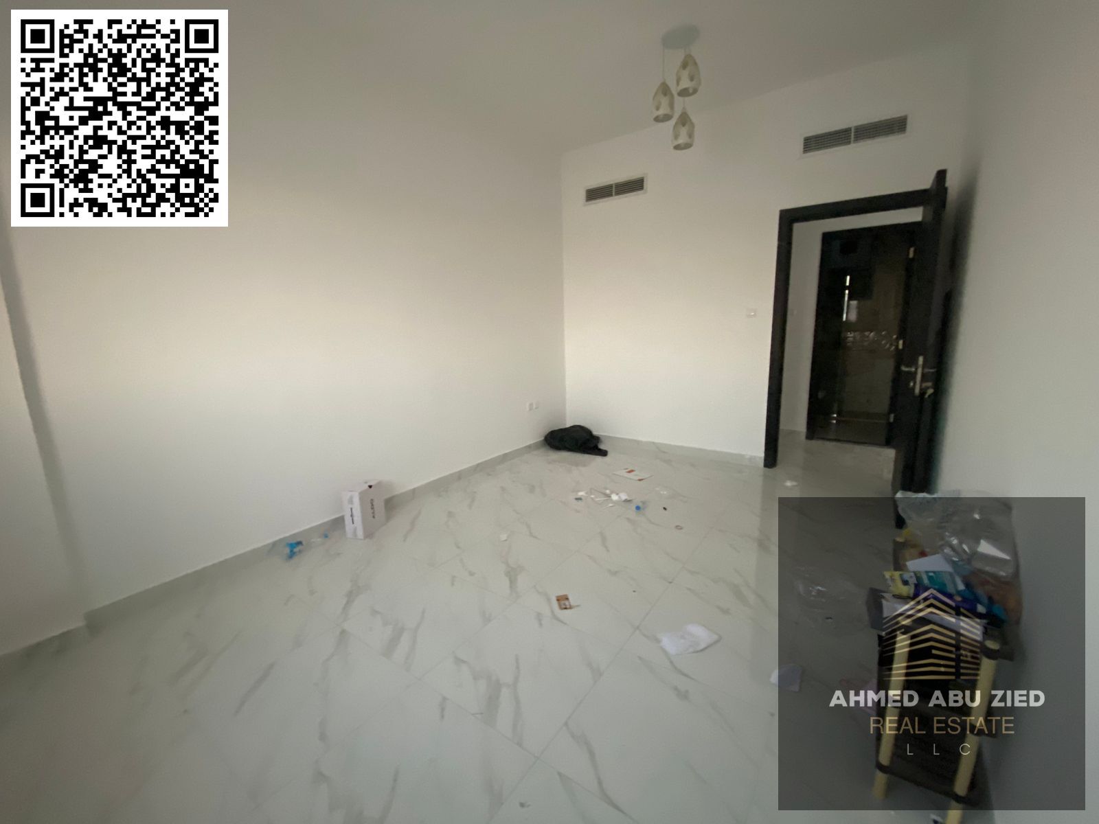 Two rooms and a hall for rent in Al Rawda 2, 2 bathrooms, central air conditioning, balcony with a view, 45,000 dirhams, 4 installments, cheque deposi