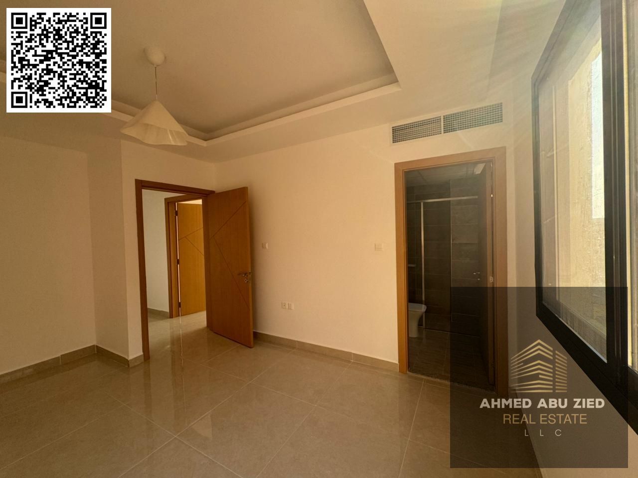Luxury two-bedroom apartment with a living room, brand new, in Al Jurf 3. Three bathrooms, balcony, AED 45,000 annually, payable in 4 or 6 installment