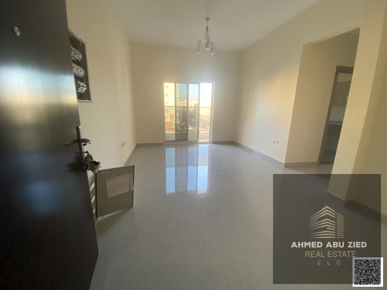 Elegant 2BR apartment for annual rent in Ajman. 3 baths, central AC, balcony, large area, fitted kitchen, close to services, easy access to Sharjah &
