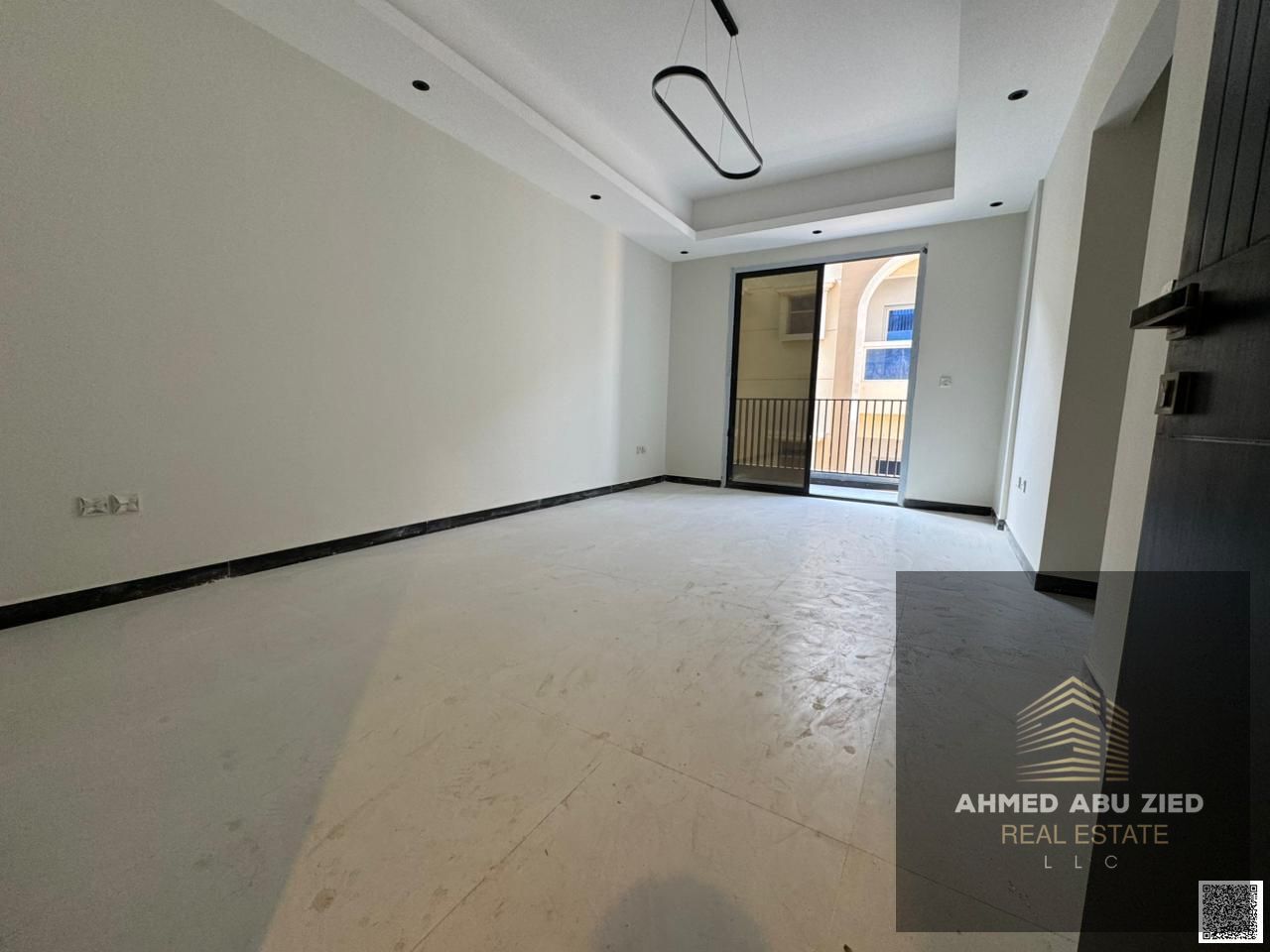 Luxury 1-bedroom apartment with living room for annual rent in Ajman, first occupancy, 2 bathrooms, balcony, modern decor, near all amenities.