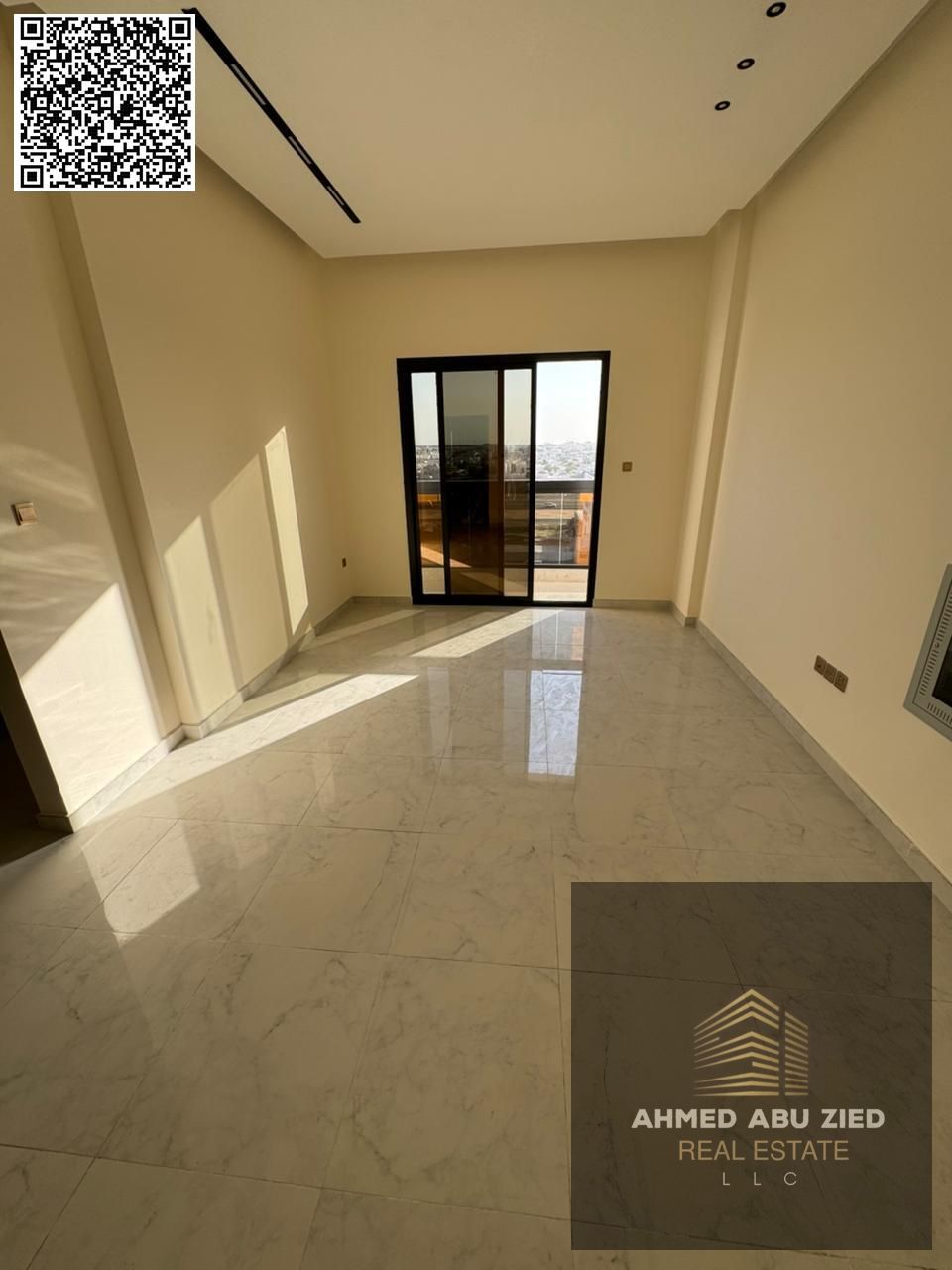 Two bedrooms and a living room with three bathrooms , one month free, brand new building, first occupancy, with a fully equipped kitchen, in Al Jurf 3