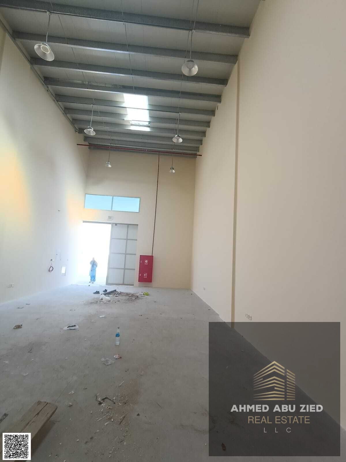 Annual warehouse for rent in Al Jurf Industrial 2, 3,000 sq. ft with new mezzanine, 30 KW power, prime location near Sheikh Mohammed Bin Zayed Road.