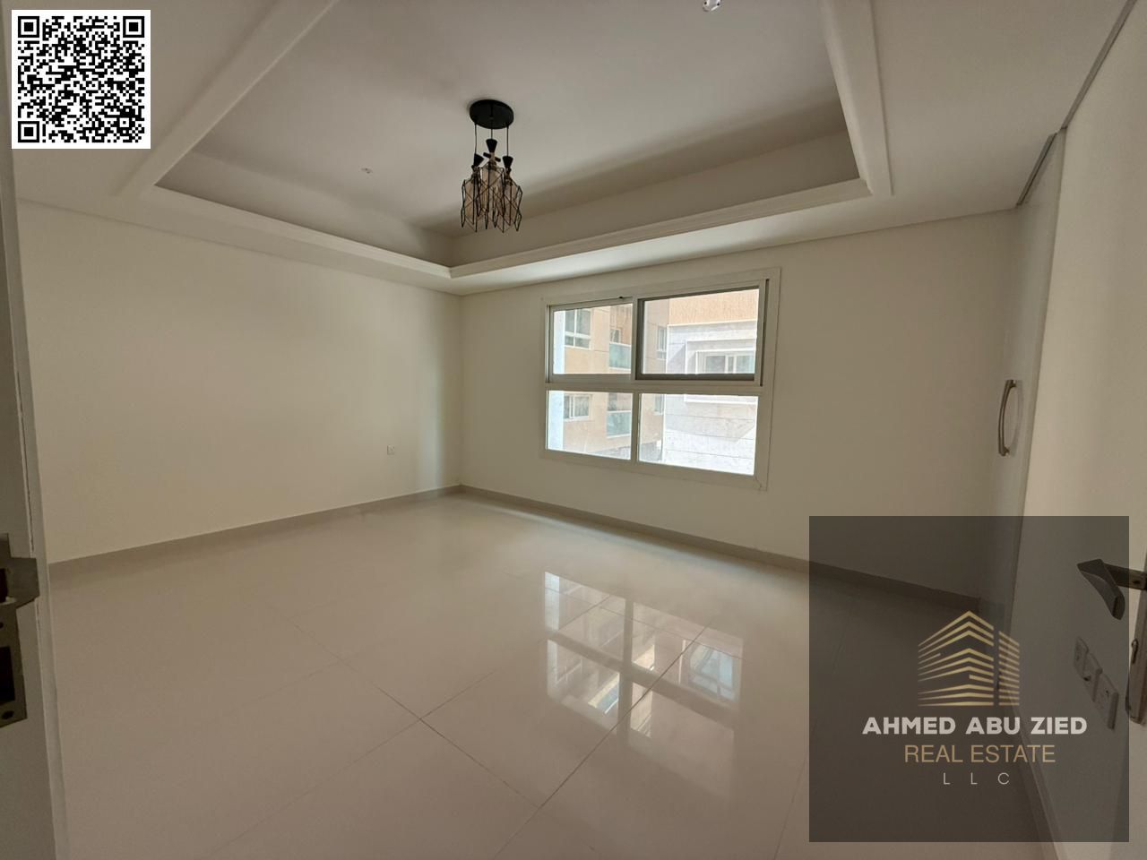 A brand new, three-bedroom apartment in Al Muwaihat 3, next to Al Shuwaifat School. It features two master bedrooms, three bathrooms, a living room, a