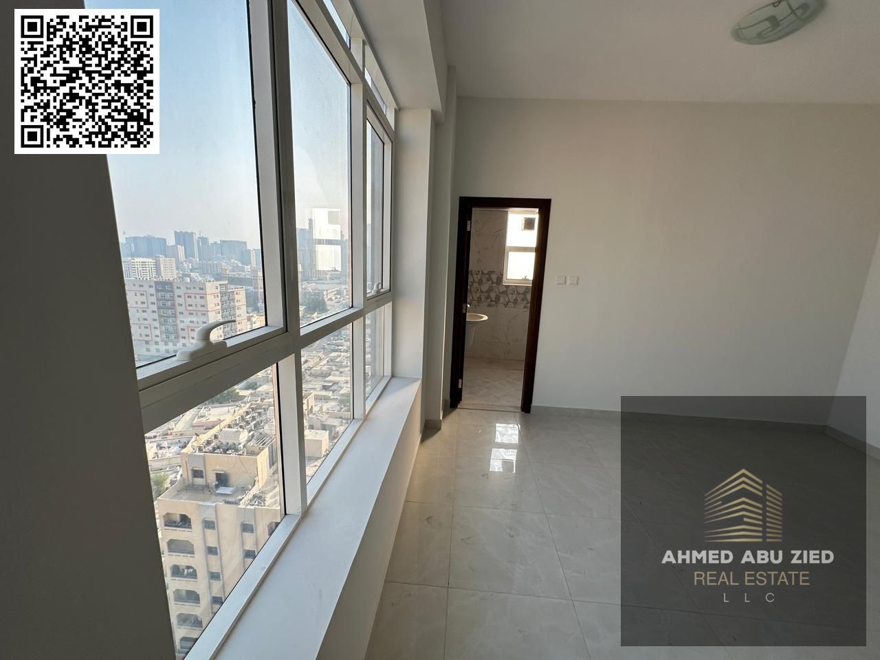 Luxury two-bedroom apartment with a living room, first occupancy in Al Rumaila, 3 bathrooms, 2 balconies, parking, close to Ajman Corniche, rent 56,00