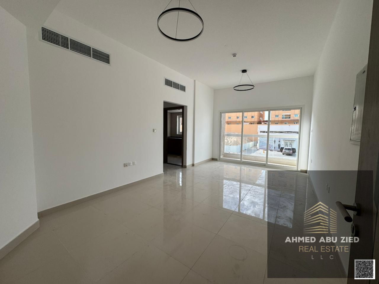 Beautiful 1BR for annual rent in Ajman, master room, spacious hall, balcony, modern lighting and decor, near all services, easy access to Sharjah Duba