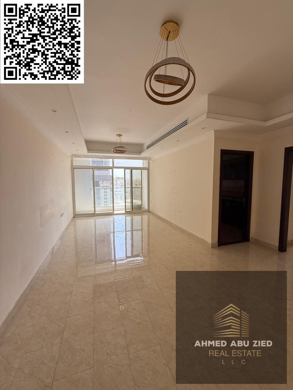 For annual rent - spacious 3 bedroom apartment in Al Rawda 2, Ajman (opposite Kanz Mall) with 3 bathrooms, a room with built-in wardrobes, one month f