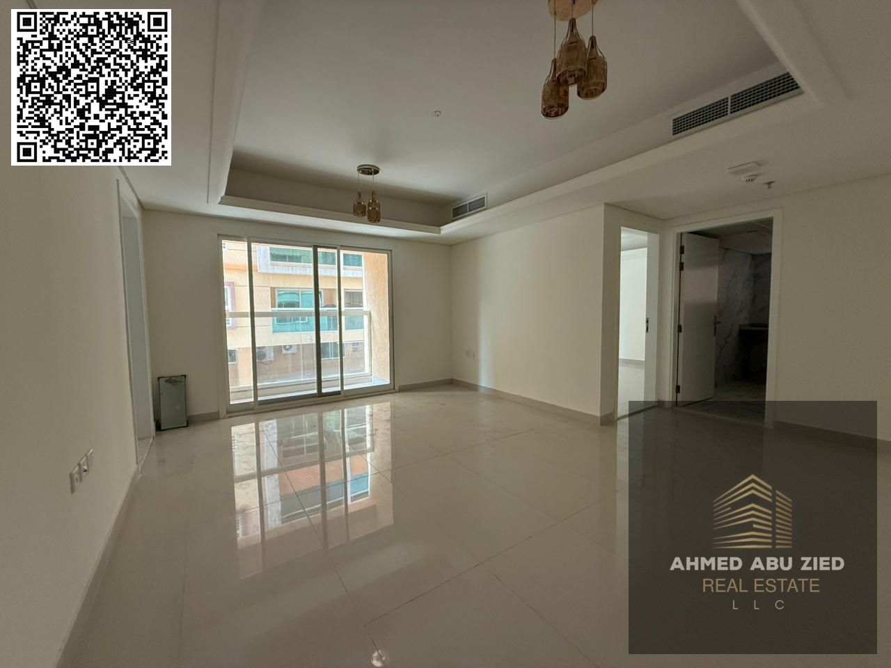For annual rent in Ajman, a brand new building offers a one-bedroom apartment with a living room, storage room, built-in wardrobes, a balcony
