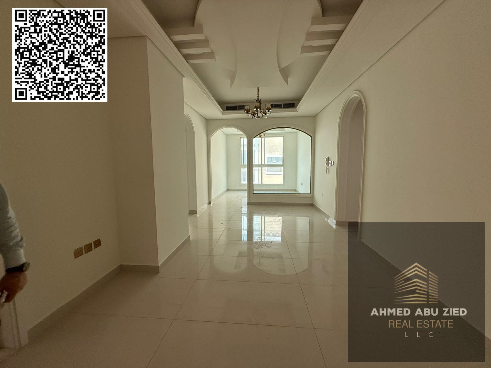 For annual rent in Ajman, a new building offers a two-bedroom apartment with a living room, two bathrooms, a balcony with an open view, spacious layou