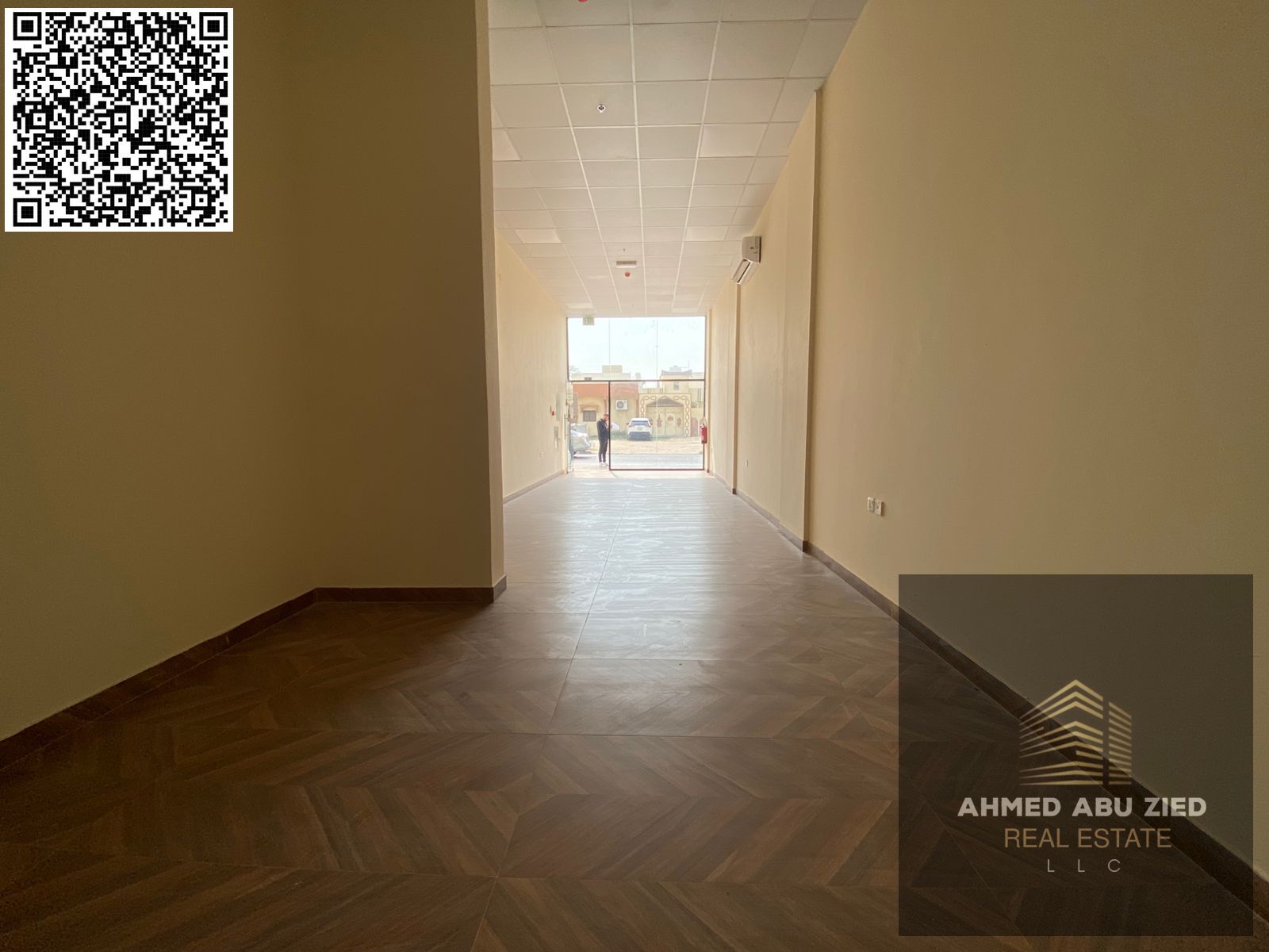 For annual rent in Ajman, a commercial space with a bathroom is available in Al Rawda 2, directly on Sheikh Ammar Street. Its prime location makes it